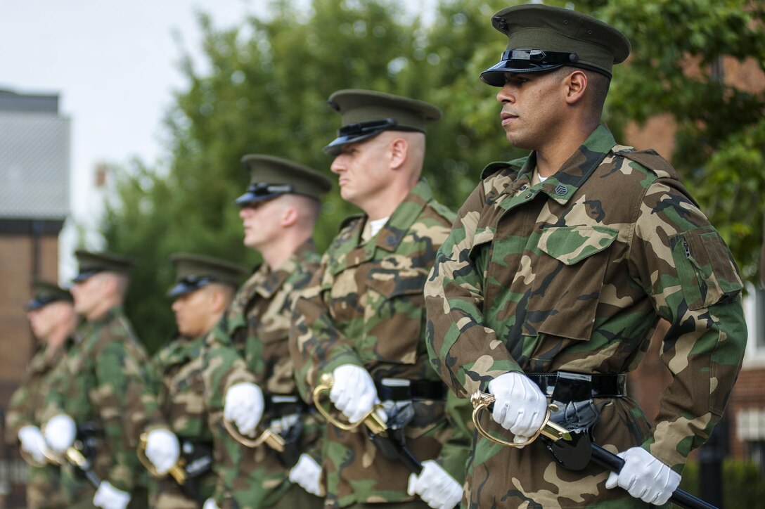 Staff noncommissioned officers from Marine Barracks Washington, D.C., practice draw sword during Ceremonial Drill School at the Barracks Oct. 4.