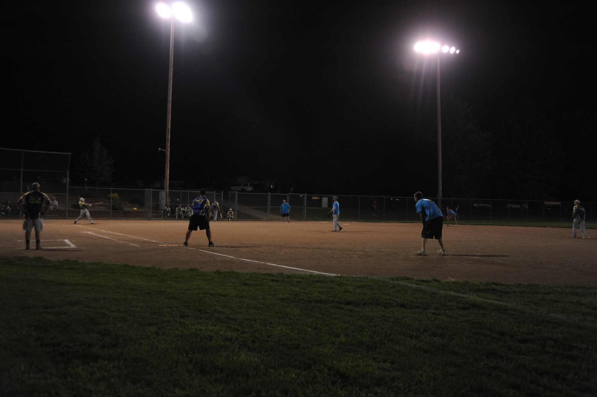 The 509th Security Forces Squadron A-team plays against a local team in Warrensburg, Mo., Sept. 27, 2013, in preparation for the upcoming All World Sports East Coast Nationals/Military Worlds competition in Georgia. The team was recently named the champion of the Whiteman Air Force Base intramural softball league. (U.S. Air Force photo by Staff Sgt. Brigitte N. Brantley/Released)