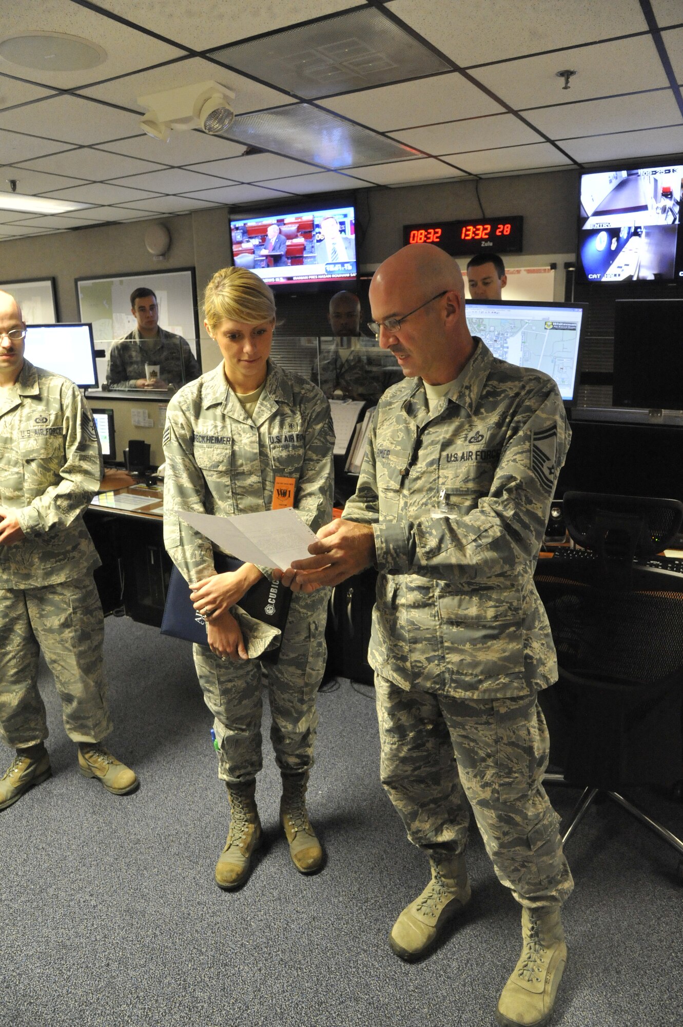 Senior Airman Bryenna Breckheimer, 2012 Air Force Global Strike Command Outstanding Airman of the Year, visits with Airmen from the 509th Bomb Wing Command Post at Whiteman Air Force Base, Mo., Sept. 25, 2013. Many Whiteman Airmen presented a variety of concerns to Breckheimer, on issues ranging from enlisted performance ratings to out-processing. (U.S. Air Force photo by Airman 1st Class Keenan Berry/Released)