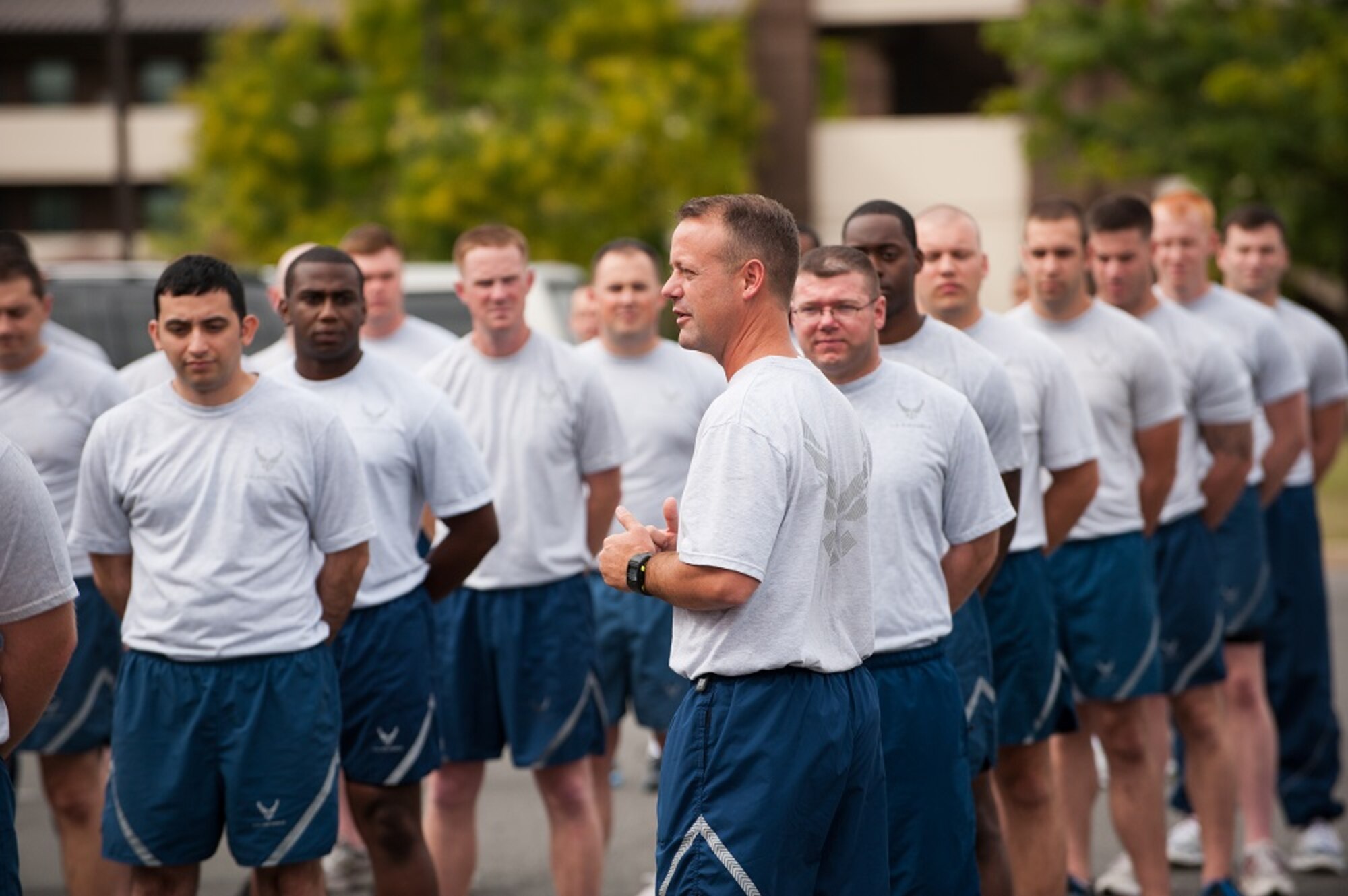 Col. James C. Hodges, Joint Base McGuire-Dix-Lakehurst commander, speaks to members of the Airmen Leadership School prior to the formation run Sept. 27, 2013, on Joint Base McGuire-Dix-Lakehurst, N.J. Leadership and supervisors were invited to participate in the two mile run around JB MDL. The significance of the run is to put the airmen in the front and leadership in the back to support the decisions that they will make in the future. (U.S. Air Force photo by Russ Meseroll/Released)