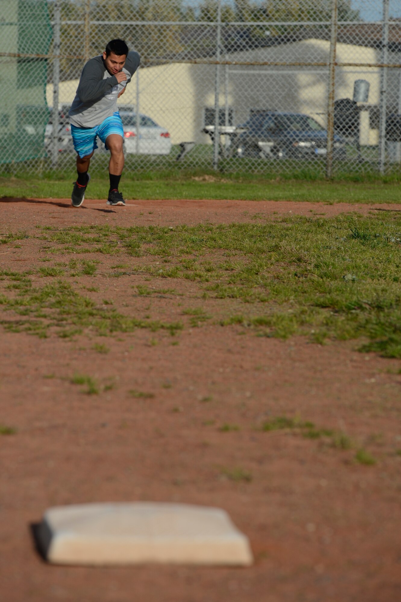 SPANGDAHLEM AIR BASE, Germany -- U.S. Air Force Airman 1st Class Lawrence Westmoreland, 52nd Fighter Wing financial services technician, sprints toward first base during the kickball of Wing Sports Day Oct. 3, 2013. A free barbeque and multiple sporting events highlighted the day’s events.  (U.S. Air Force photo by Staff Sgt. Christopher Ruano/Released)