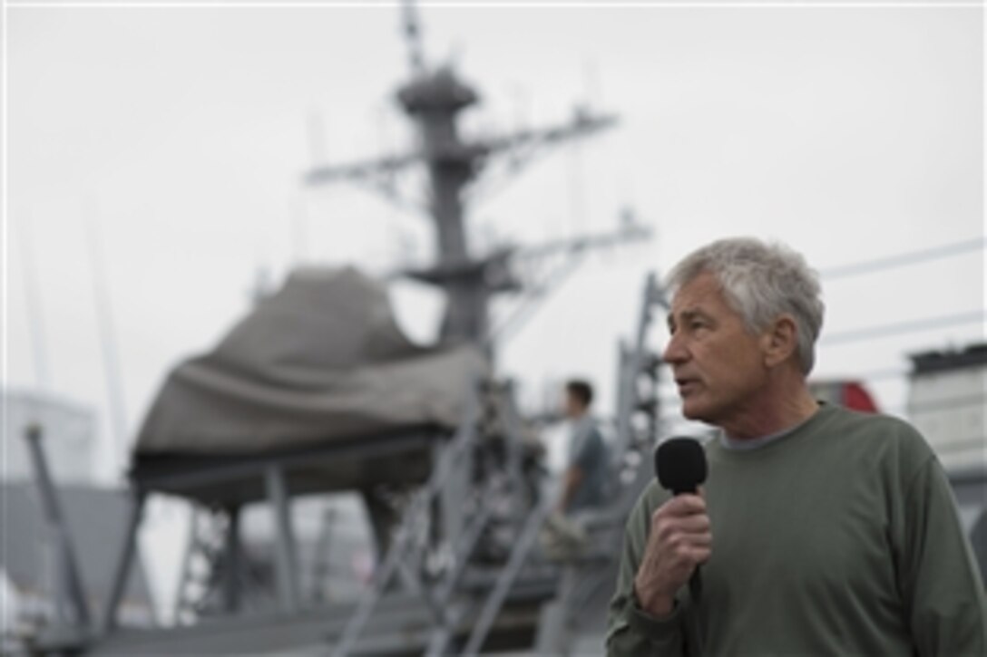 U.S. Defense Secretary Chuck Hagel speaks with troops aboard the USS Stethem on Yokosuka Naval Base, Japan in Tokyo, Oct.  4, 2013. 