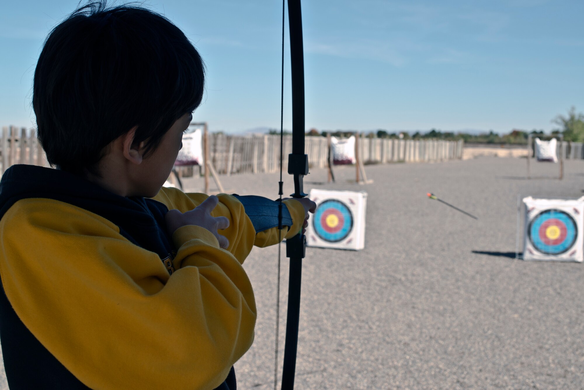 Sixth-grader Liam Wallace shoots a longbow at a target during a Mountain Home Air Force Base Youth Center archery class at the base archery range, Oct. 5, 2013. Liam Wallace, son of Master Sgt. Kevin Wallace, 366th Fighter Wing Public Affairs superintendent, was one of seven children to learn to shoot longbows, compound bows and recurve bows during the three-hour course. (Courtesy photo)