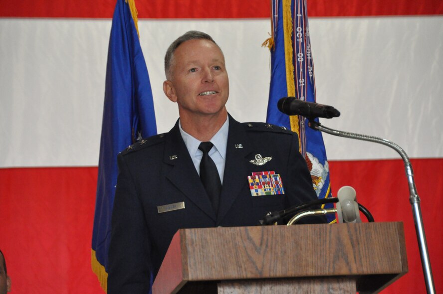 Maj. Gen. William Binger, 10th Air Force commander, expresses his thoughts on the outgoing and incoming 301st Fighter Wing commanders during their Change of Command ceremony Oct. 5 at Naval Air Station Fort Worth Joint Reserve Base, Texas. (U.S. Air Frorce photo/MSgt Julie Briden-Garcia)