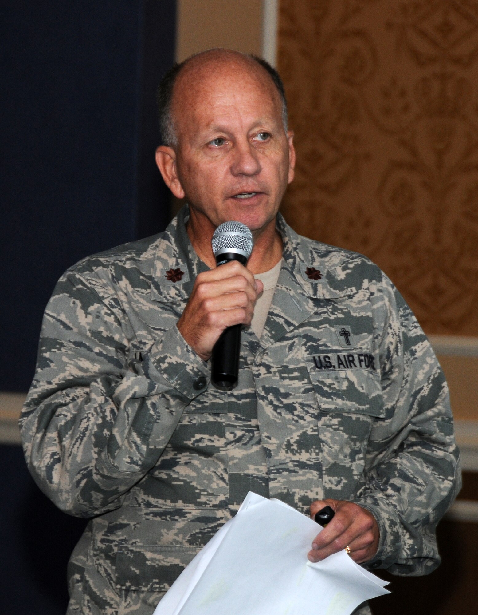 Maj. Linzy Laughhunn, 192D Fighter Wing chaplain, briefs Airmen on free exercise of religion and suicide awareness and prevention during the unit’s wing-wide ancillary training, September 15, 2013. Airmen of the unit received briefings on various topics including cultural considerations, professional and unprofessional relationships, law of armed conflict, and human relations. (U.S. Air National Guard photo by Master Sgt. Carlos J. Claudio/Released)