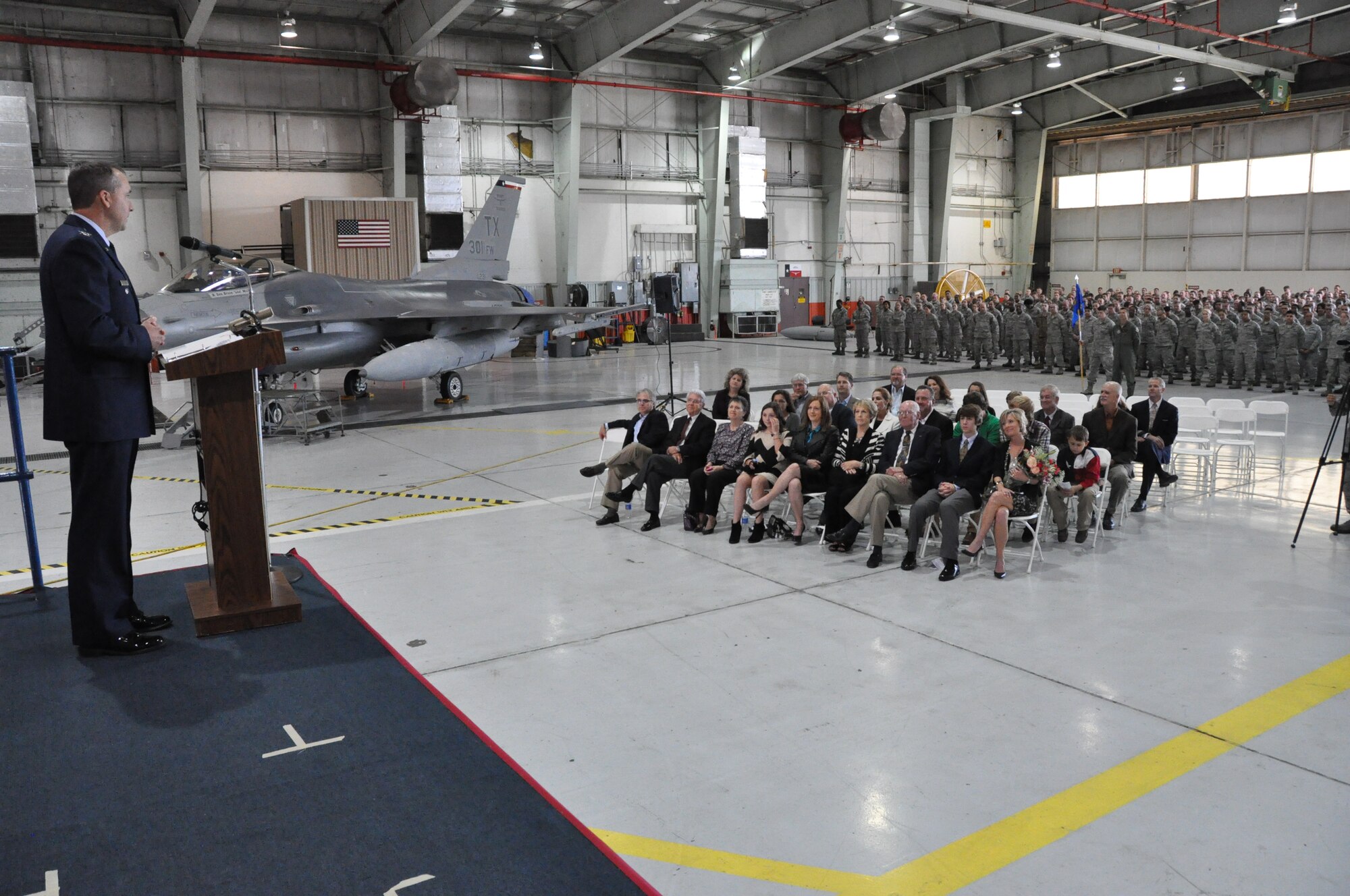 Colonel John M. Breazeale, 301st Fighter Wing commander,  addresses wing members for the first time during his assumption of command ceremony Saturday, Oct. 5 at Naval Air Station Fort Worth Joint Reserve Base, Texas. Breazeale joins the wing from Barksdale Air Force Base, La., where he was the commander of the 917th Fighter Group assigned to the 442nd Fighter Wing. (U.S. Air Force photo by Senior Airman Melissa Harvey)