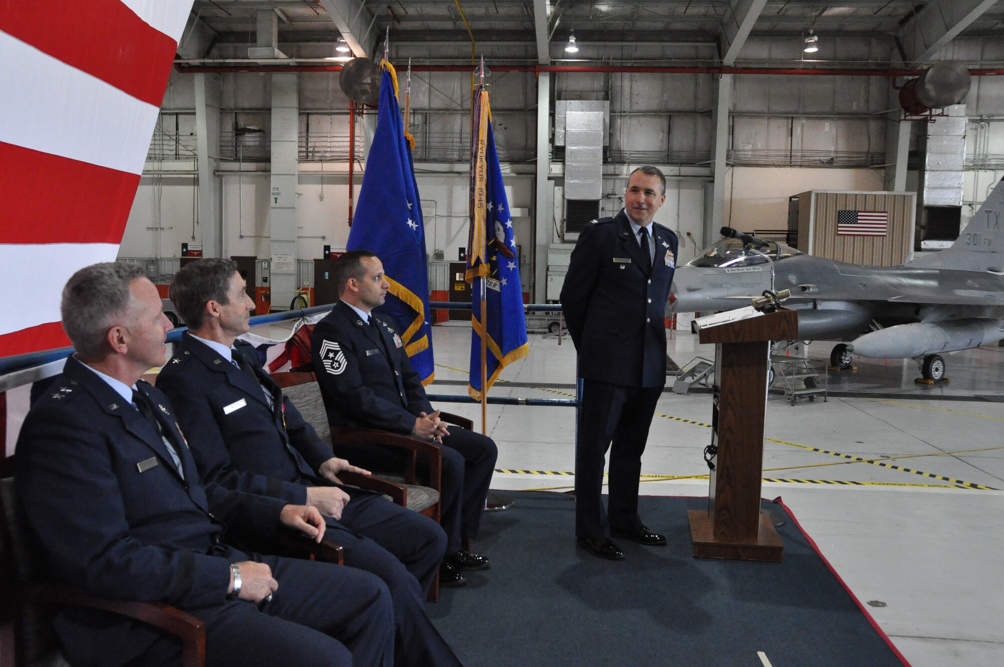 Colonel John M. Breazeale, 301st Fighter Wing commander,  addresses 10th Air Force Commander, Maj. Gen. William B. Binger, former 301st commander, Brig. Gen. Ronald B. Miller, and Chief Brian Pensky, 301st command chief during his assumption of command ceremony Saturday, Oct. 5 at Naval Air Station Fort Worth Joint Reserve Base, Texas. Breazeale joins the wing from Barksdale Air Force Base, La., where he was the commander of the 917th Fighter Group assigned to the 442nd Fighter Wing. (U.S. Air Force photo by Senior Airman Melissa Harvey)