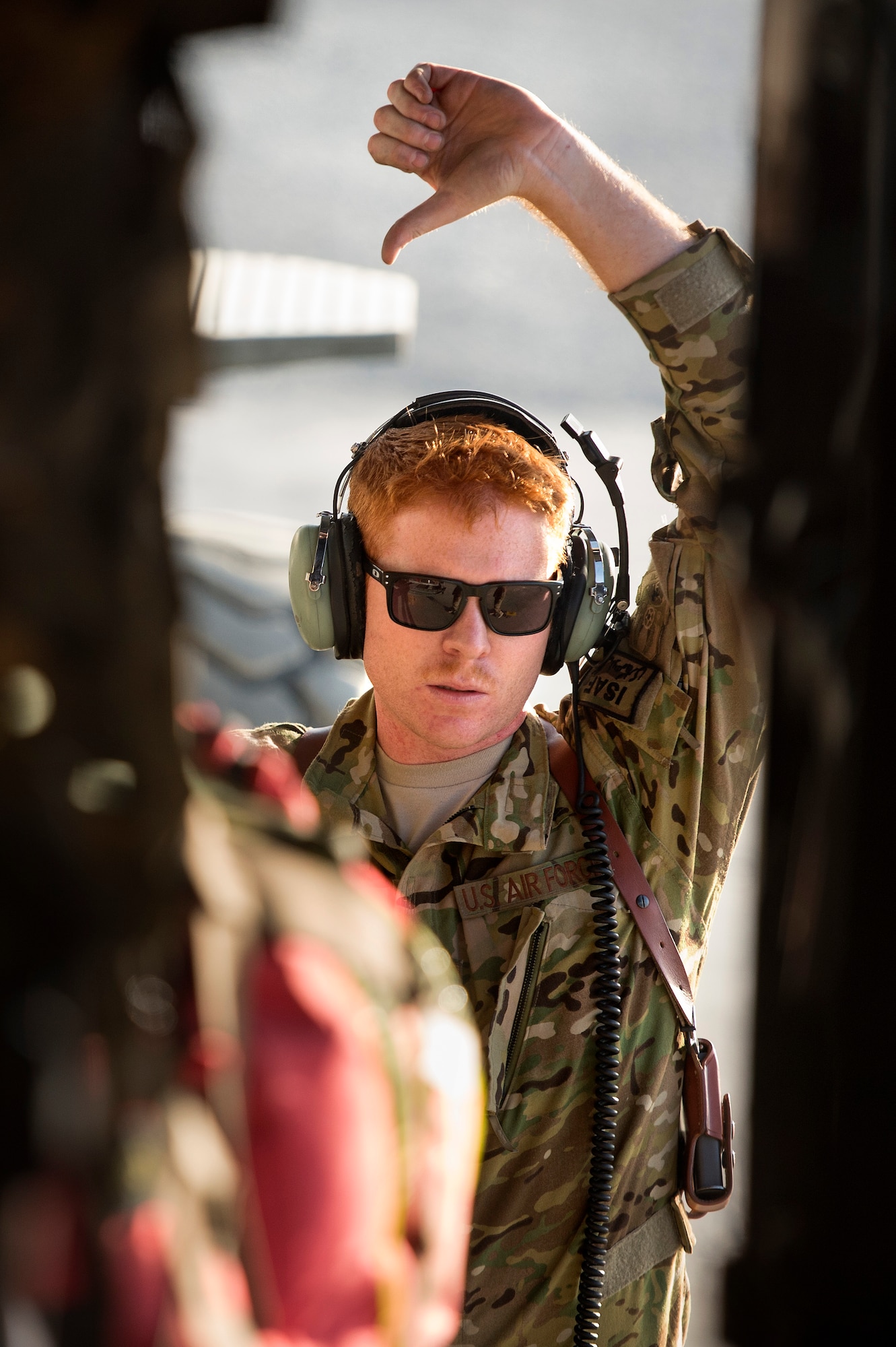 Staff Sgt. Nick Sanborn, 774th Expeditionary Airlift Squadron loadmaster, marshals a pallet of cargo into a C-130 Hercules at Forward Operating Base Sharana, Paktika province, Afghanistan, Sept. 28, 2013. This mission marked a retrograde milestone as the 774th EAS transported the last cargo from FOB Sharana before the base is transferred to the Afghan Ministry of Defense. Sanborn, a Vacaville, Calif. native, is deployed from Little Rock Air Force Base, Ark. (USAF Photo/Master Sgt. Ben Bloker)