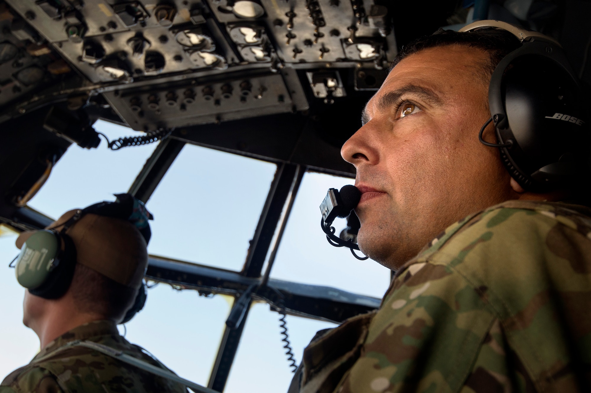 Staff Sgt. David Billings, 774th Expeditionary Airlift Squadron flight engineer, monitors instrument data on a C-130 Hercules cargo plane in route to Forward Operating Base Sharana, Paktika province, Afghanistan, Sept. 28, 2013. This mission marked a retrograde milestone as the 774th EAS transported the last cargo from FOB Sharana before the base is transferred to the Afghan Ministry of Defense. Billings, a Cabot, Ark., native, is deployed from the Little Rock, Arkansas Air National Guard. 