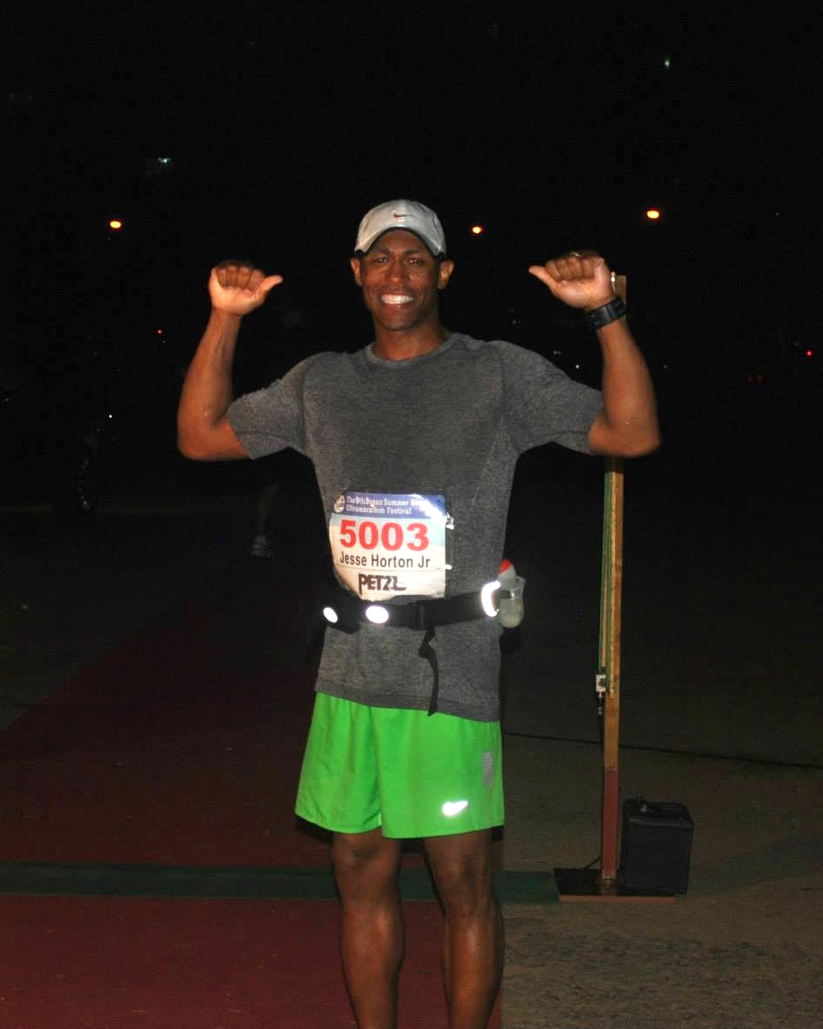 Master Sgt. Jesse Horton, 8th Security Forces Squadron command support staff member, celebrates after completing the Busan Beach ultra-marathon at Busan, Republic of Korea, August 2013. Horton completed his first 50K race with the support and inspiration of a fellow Airman and hopes to do the same for others. (Courtesy Photo)