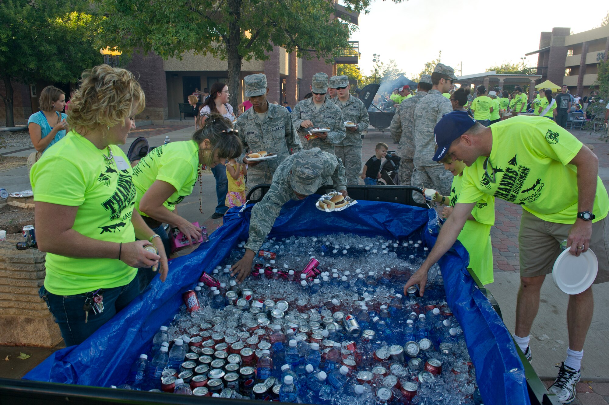 Volunteers from the Tularosa Basin community provided food and drinks for the annual Thanks Team Holloman celebration, held in the dormitory courtyards at Holloman Air Force Base N.M., Oct. 4. This annual event is hosted by the Committee of 50 and local businesses from Alamogordo to show their appreciation for all members of Team Holloman. (U.S. Air Force photo by Airman 1st Class Chase Cannon/Released)