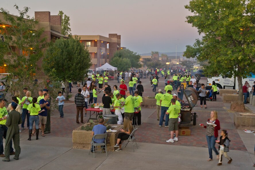 Volunteers from the Tularosa Basin community serve food to members of Team Holloman in the dormitory courtyard during this year’s Thanks Team Holloman celebration at Holloman Air Force Base, N.M., Oct. 4. This annual event is hosted by the Committee of 50 and local businesses from Alamogordo to show their appreciation for all members Team Holloman. (U.S. Air Force photo by Airman 1st Class Chase Cannon/Released)