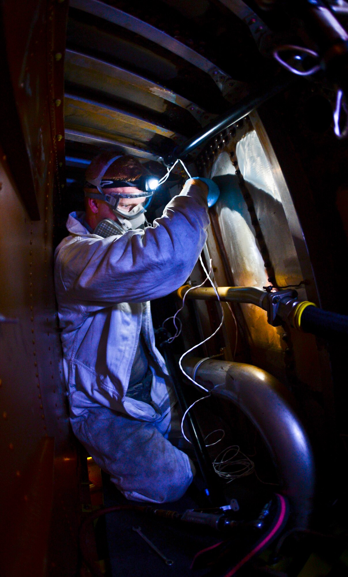 Senior Airman Michael Cordle, 6th Maintenance Squadron aircraft fuel systems technician, replaces a faulty fuel probe on a KC-135 Stratotanker aircraft at MacDill Air Force Base, Fla. Oct. 1, 2013. Each KC-135 Stratotanker is equipped with over 30 fuel probes that are computed together to give exact calculations to the aircraft's fuel quantity evaluation systems. (U.S. Air Force photo by Staff Sgt. Brandon Shapiro/Released)