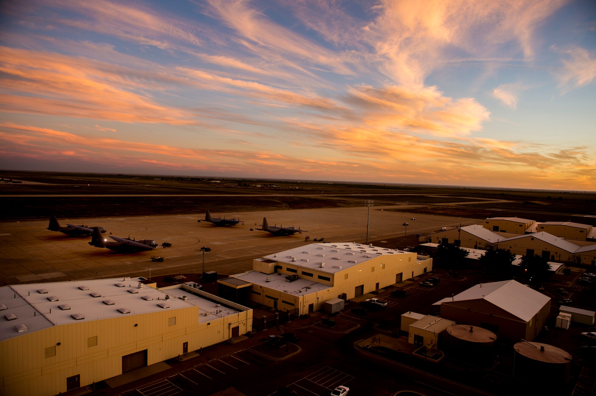 Air crews from Hurlburt Field, Fla., secure their aircraft at Cannon Air Force base, N.M. Oct. 3. Air frames from the 1st Special Operations wing were relocated to Cannon in an effort to protect government assets in the wake of Tropical Storm Karen. (U.S. Air Force photo/ Staff Sgt. Matthew Plew)