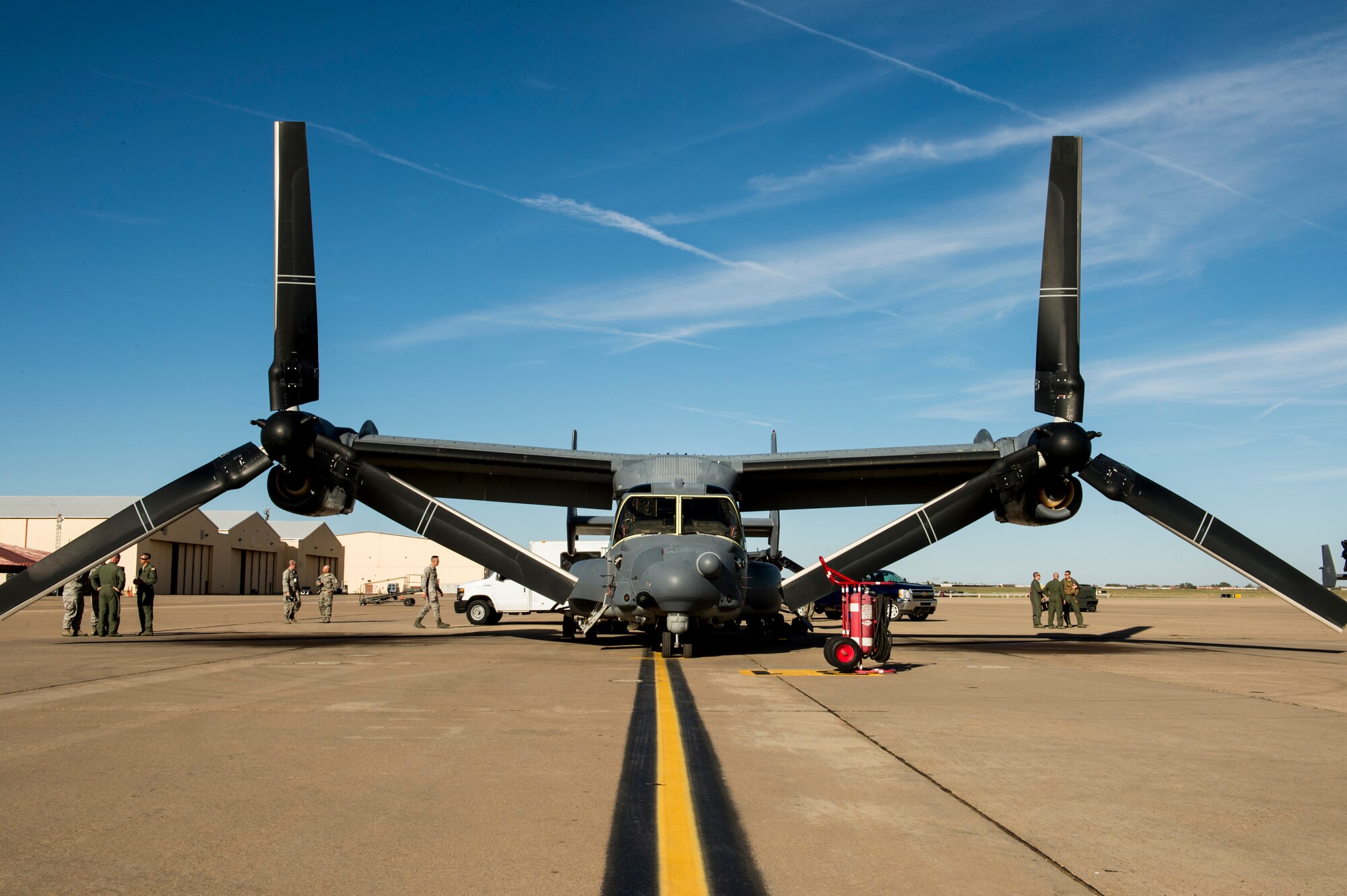 CV-22 Air crews from Hurlburt Field, Fla., secure their aircraft at Cannon Air Force base, N.M. Oct. 3. Air frames from the 1st Special Operations wing were relocated to Cannon in an effort to protect government assets in the wake of Tropical Storm Karen. (U.S. Air Force photo/ Staff Sgt. Matthew Plew)