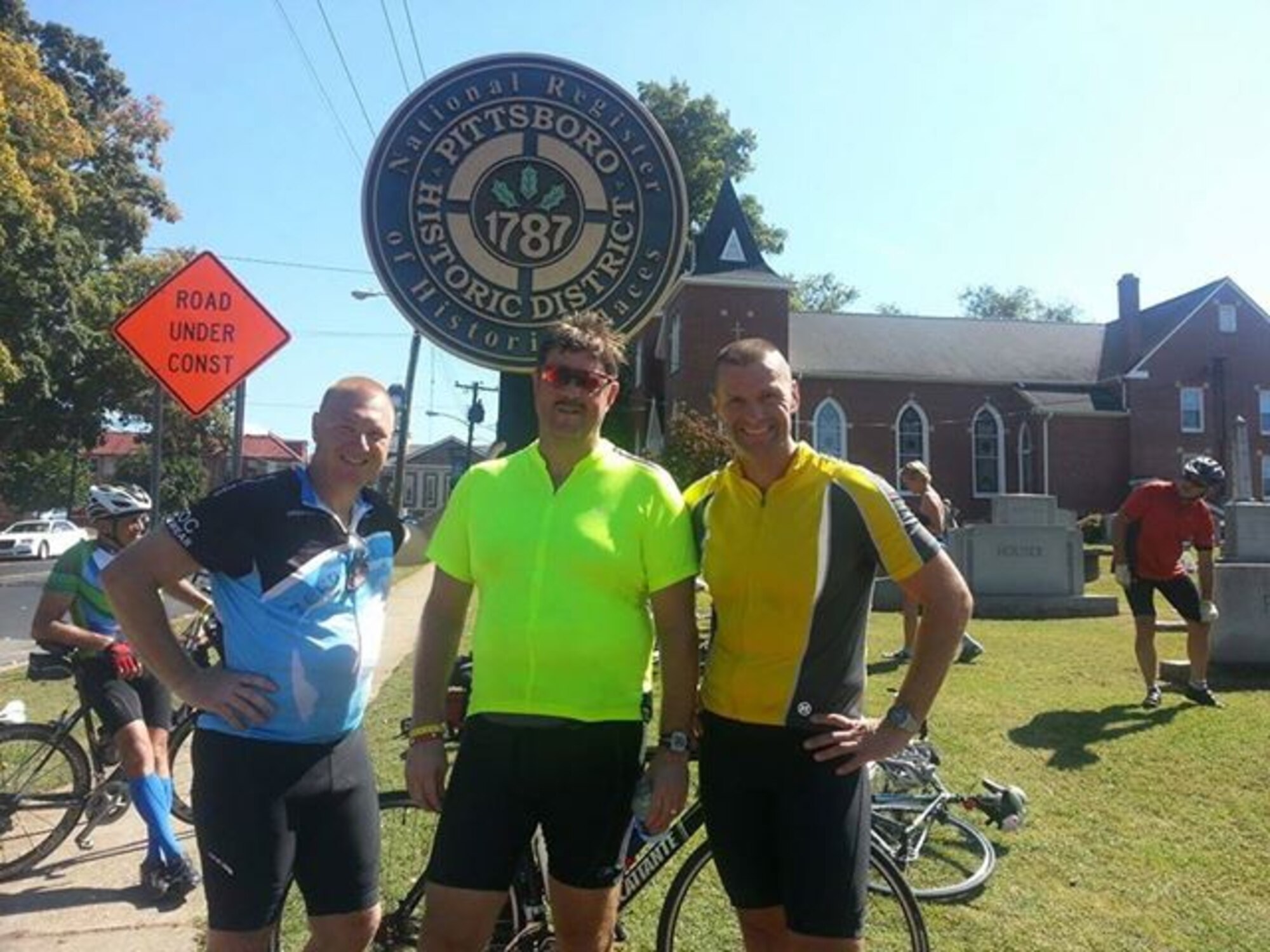From left to right: Maj. Ted Janicki, Col. Greg Gilmour and Lt. Col. Phil Heseltine stop to send a picture back home as they stop somewhere in North Carolina as part of the Mountains to Coast bike ride. The three 916th Air Refueling Wing officers biked nearly 500 miles in a seven day period that ended on Saturday. (USAF courtesy photo)