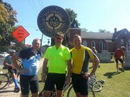 From left to right: Maj. Ted Janicki, Col. Greg Gilmour and Lt. Col. Phil Heseltine stop to send a picture back home as they stop somewhere in North Carolina as part of the Mountains to Coast bike ride. The three 916th Air Refueling Wing officers biked nearly 500 miles in a seven day period that ended on Saturday. (USAF courtesy photo)