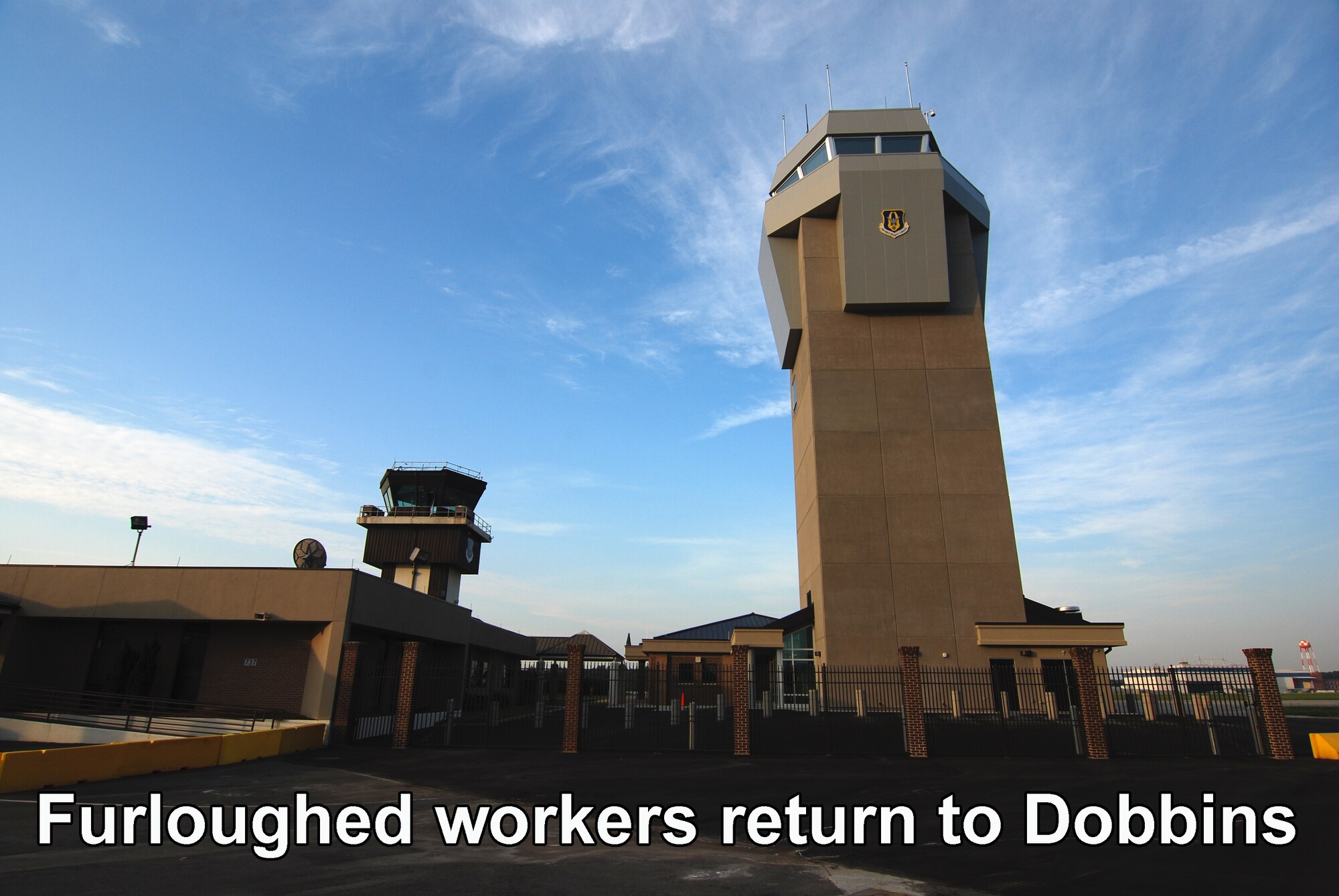 Dobbins Air Reserve Base air traffic control tower (U.S. Air Force photo illustration/Senior Airman Elizabeth Van Patten)