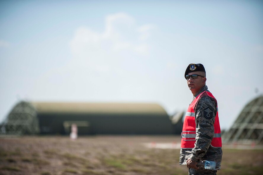 Master Sgt. Timothy Miller, 39th Security Forces Squadron NCOIC of installation security, oversees a force-on-force training exercise Sept. 25, 2013, at Inicirlik Air Base, Turkey.  Miller, as well as other 39th SFS leaders, guided and challenged SFS Airmen during the exercise. (U.S. Air Force photo by Airman 1st Class Nicole Sikorski/Released)
