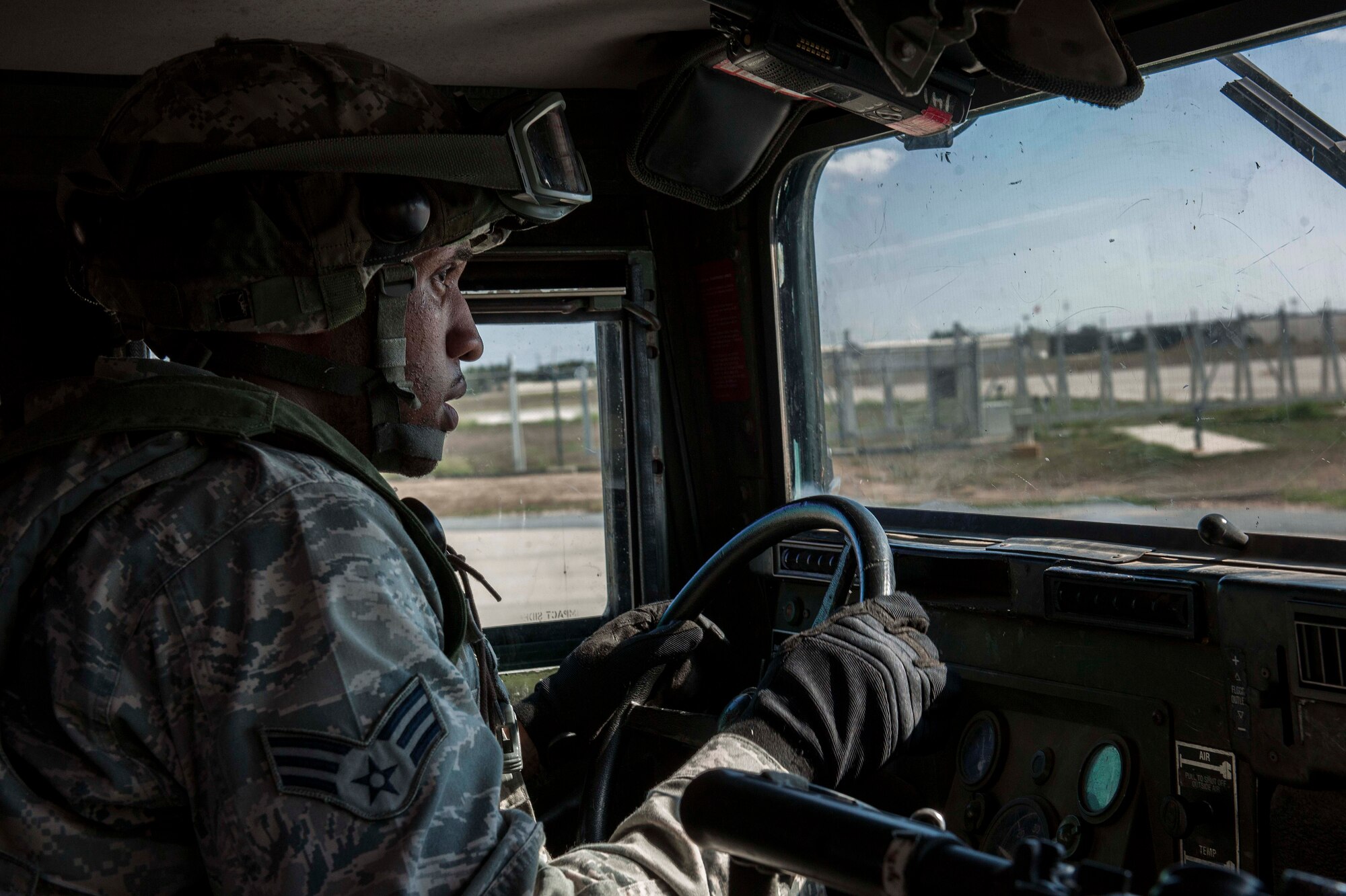 Senior Airman Donzel Savoy, 39th Security Forces patrolman, drives a Humvee during a force-on-force training  exercise Sept. 25, 2013, at Incirlik Air Base, Turkey. Security forces Airmen across the Air Force are required to participate in various exercises throughout the year to ensure mission readiness.  (U.S. Air Force photo by Airman 1st Class Nicole Sikorski/Released)