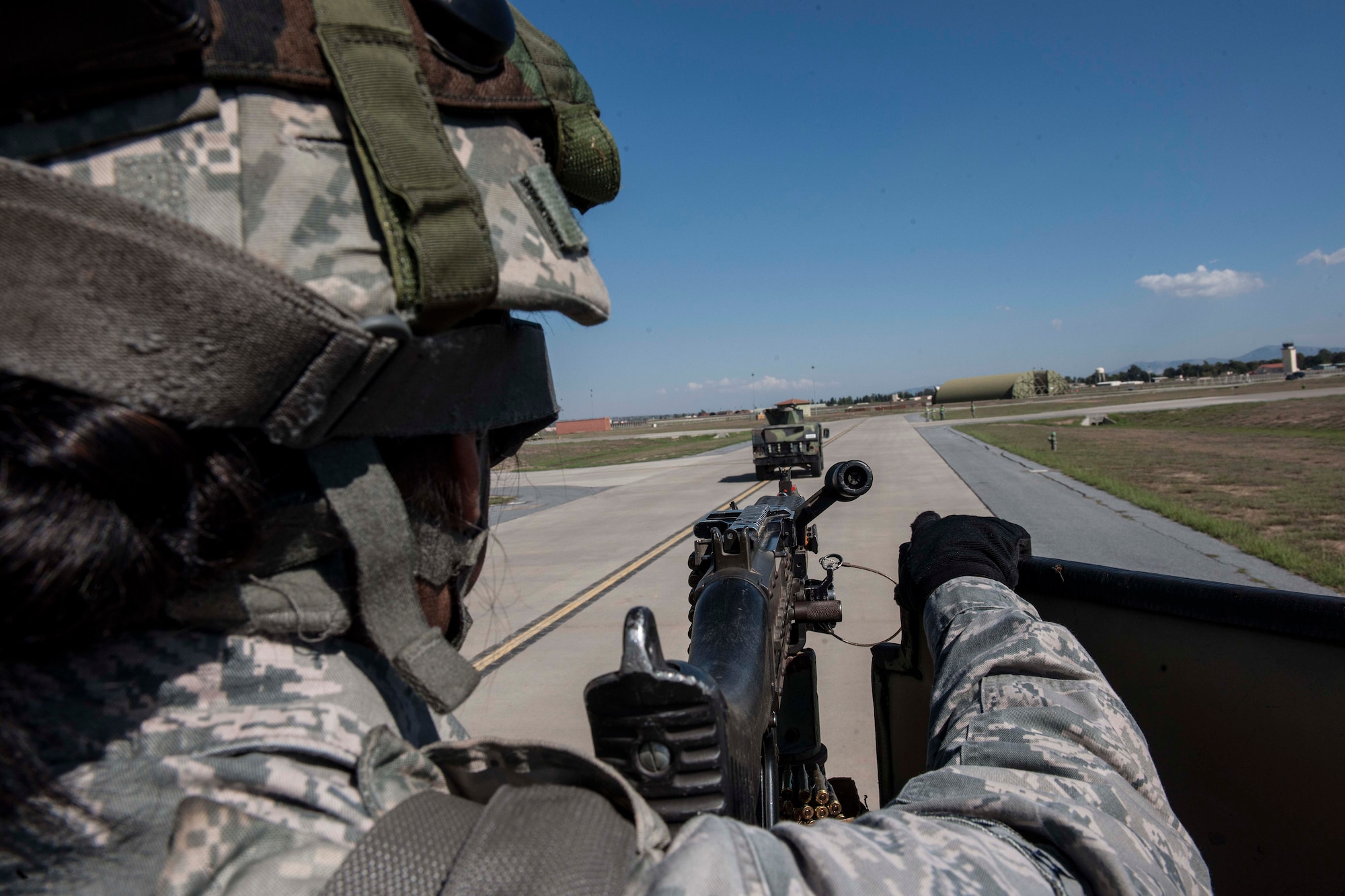 Airmen 1st Class Zujey Chavez Flores, 39th Security Forces Squadron patrolman, sits in a turret with her M-240B machine gun during a force-on-force training exercise Sept. 25, 2013, at Inicirlik Air Base, Turkey. All security forces Airmen receive training in a variety of scenarios to remain proficient and deal with constantly evolving situations. (U.S. Air Force photo by Airman 1st Class Nicole Sikorski/Released)