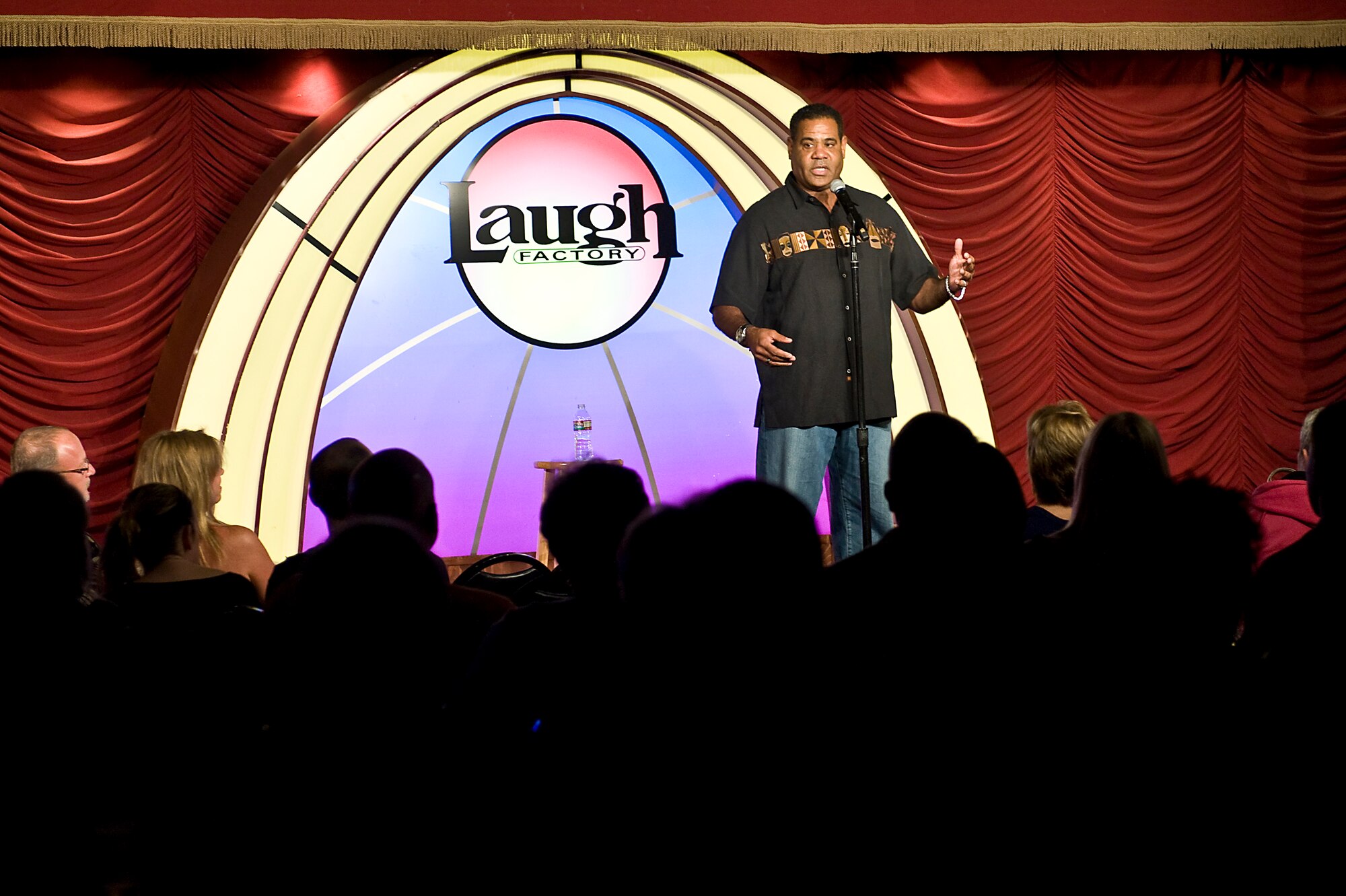 Juan Canopii, a staff sergeant a 114th Fighter Squadron aircrew flight equipment technician, Oregon Air National Guard and comedian, performs at the Laugh Factory at the Tropicana Hotel and Casino Oct. 5, 2013, in Las Vegas. Canopii began his acting in 1990 while he was on active-duty in the Air Force while stationed at Hickam AFB, Hawaii. He now performs at high-visibility venues and acts in television shows and movies but remains in the Air National Guard to continue to serve his country. (U.S. Air Force photo by Senior Airman Matthew Lancaster)