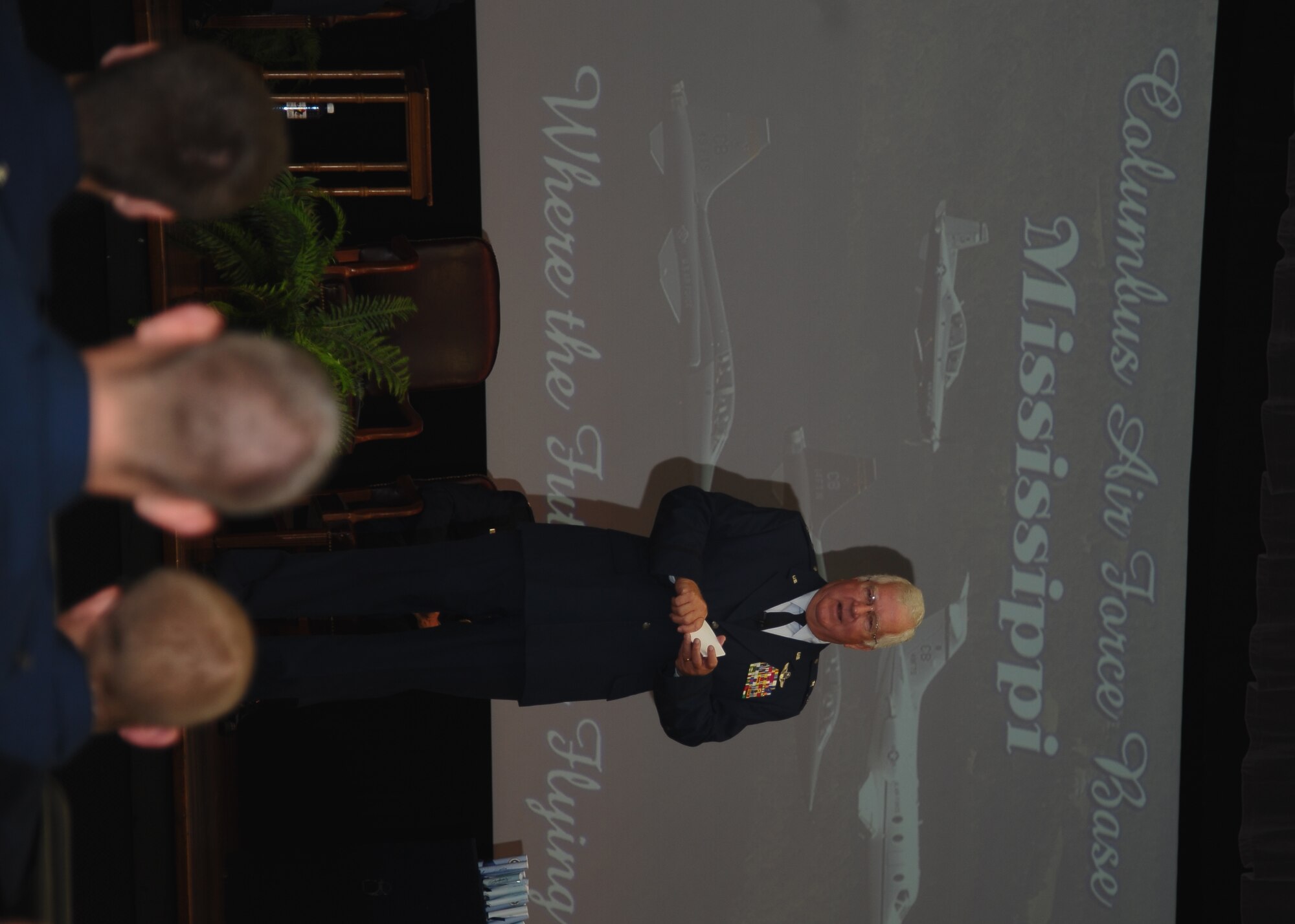 Ret. Maj. Gen. Burton Moore, United States Air Force, addresses the audience at the Specialized Undergraduate Pilot Training Class 13-15 Graduation Oct. 4 in the Kaye Auditorium. During his speech, Moore gave the graduating class tips on how to succeed in their Air Force careers and talked about how the Air Force has changed since he retired. (U.S. Air Force Photo/ Airman 1st Class Stephanie Englar) 