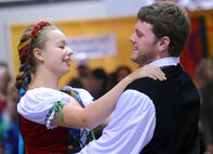 Dancers perform an authentic Scandinavian dance at Norsk Høstfest, Oct. 5. Thousands of people from all over the world gathered at the North Dakota State Fairgrounds in Minot to celebrate the festival’s 36th year. (U.S. Air Force photo/Airman 1st Class Apryl Hall)
