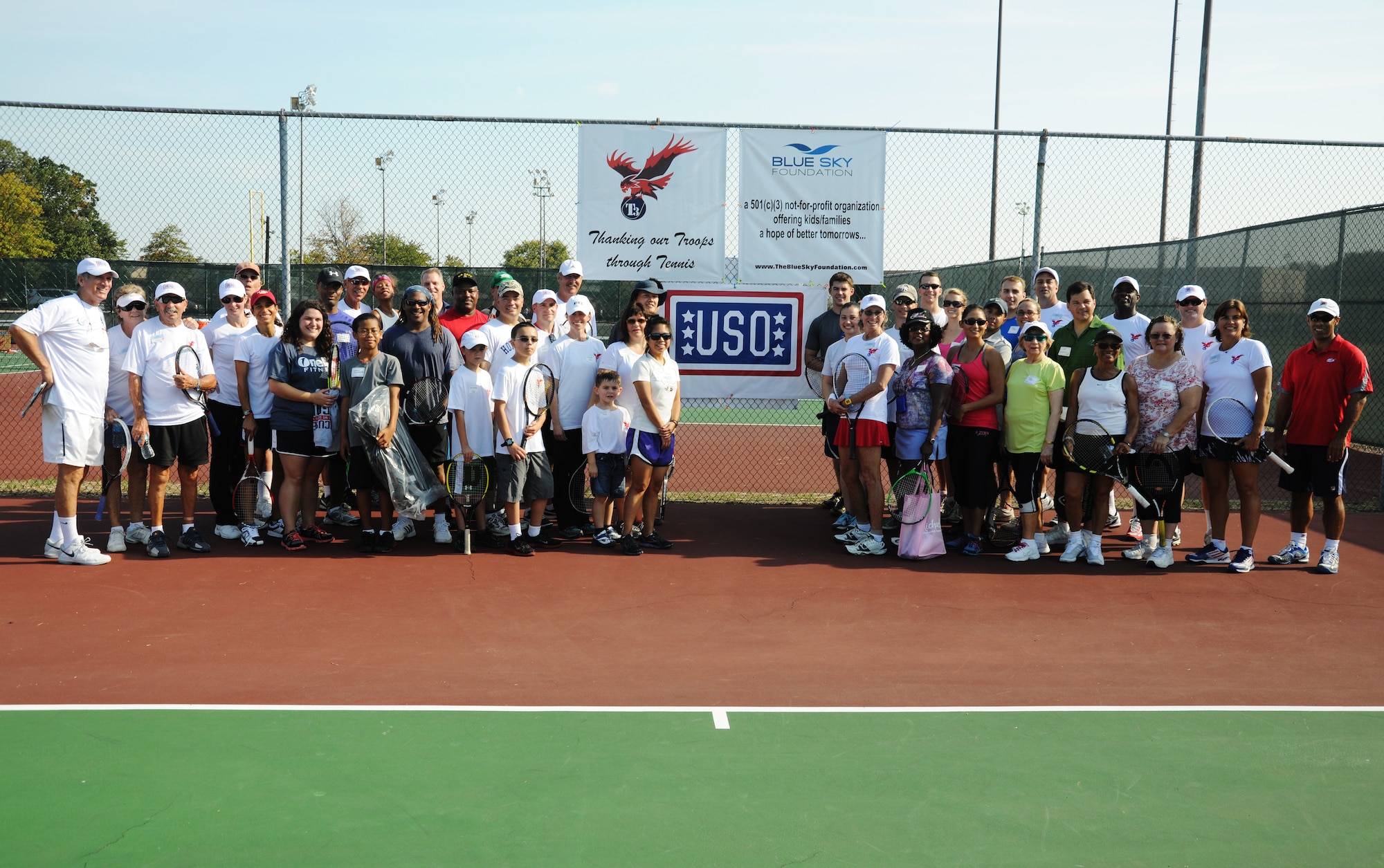 Several tennis professionals joined Airmen and their families at Joint Base Andrews, Md., Oct. 5, 2013, to give back through the Thanking Our Troops Through Tennis event.  Team Andrews members gathered to sharpen their game and play a friendly game or two at the base tennis courts. (U.S. Air Force photo/Airman 1st Class Joshua Dewberry)