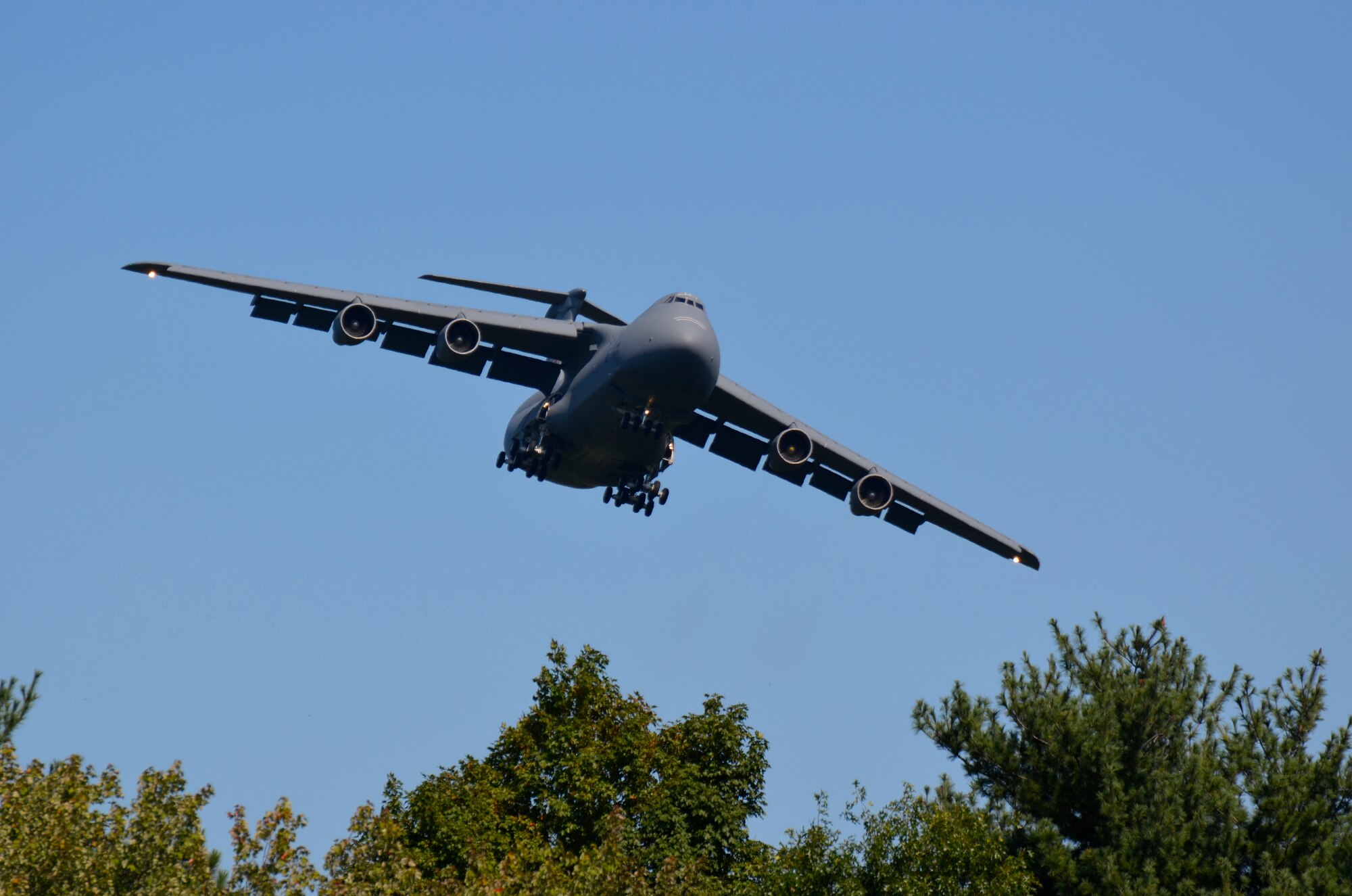 A Patriot Wing C-5B Galaxy approaches Westover during a local training mission in September. Operations at the base returned to a normal level Oct. 7, as 270 civilians were recalled from furlough due to the partial government shutdown. (US Air Force photo/MSgt. Andrew Biscoe)
