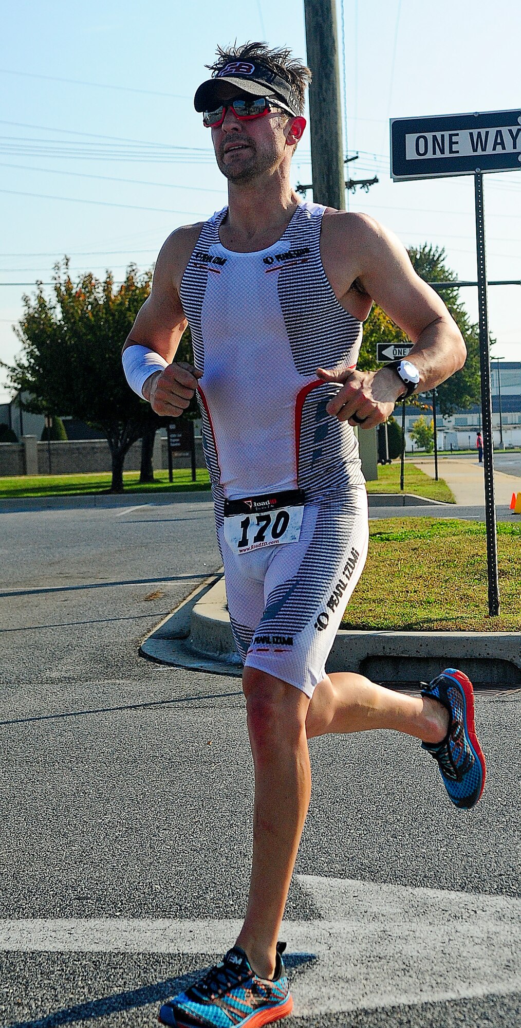 Jess Manning, the winner of the Dover Air Force Base Duathlon, crosses the finishes line with a final time of 1:18:01 on Dover AFB, Del., Oct. 5, 2013.  The Duathlon was a joint event held by Outdoor Recreation and the Fitness Center. (U.S. Air Force photo/Airman 1st Class William Johnson)