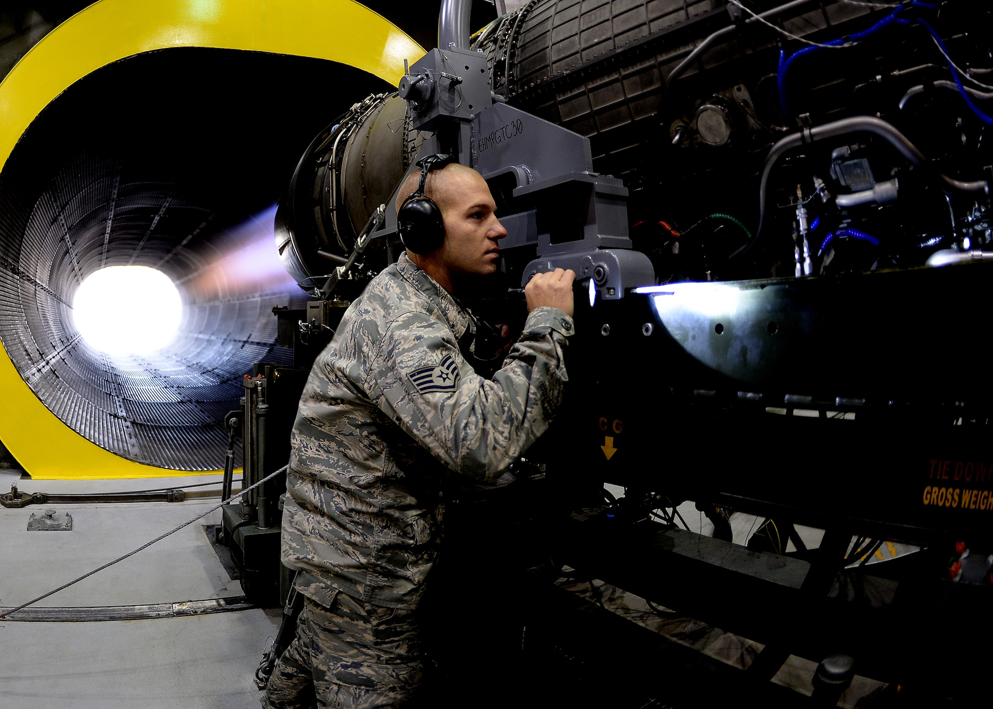 Staff Sgt. Ryan Brehm, 354th Maintenance Squadron propulsion flight dock chief, inspects an engine while it is tested at the “Hush House” Oct. 3, 2013, Eielson Air Force Base, Alaska. Airmen from the 354th MXS propulsion flight rebuild the engines from F-16 Fighting Falcons used during RED FLAG-Alaska and training. (U.S. Air Force photo by Senior Airman Shawn Nickel/Released)