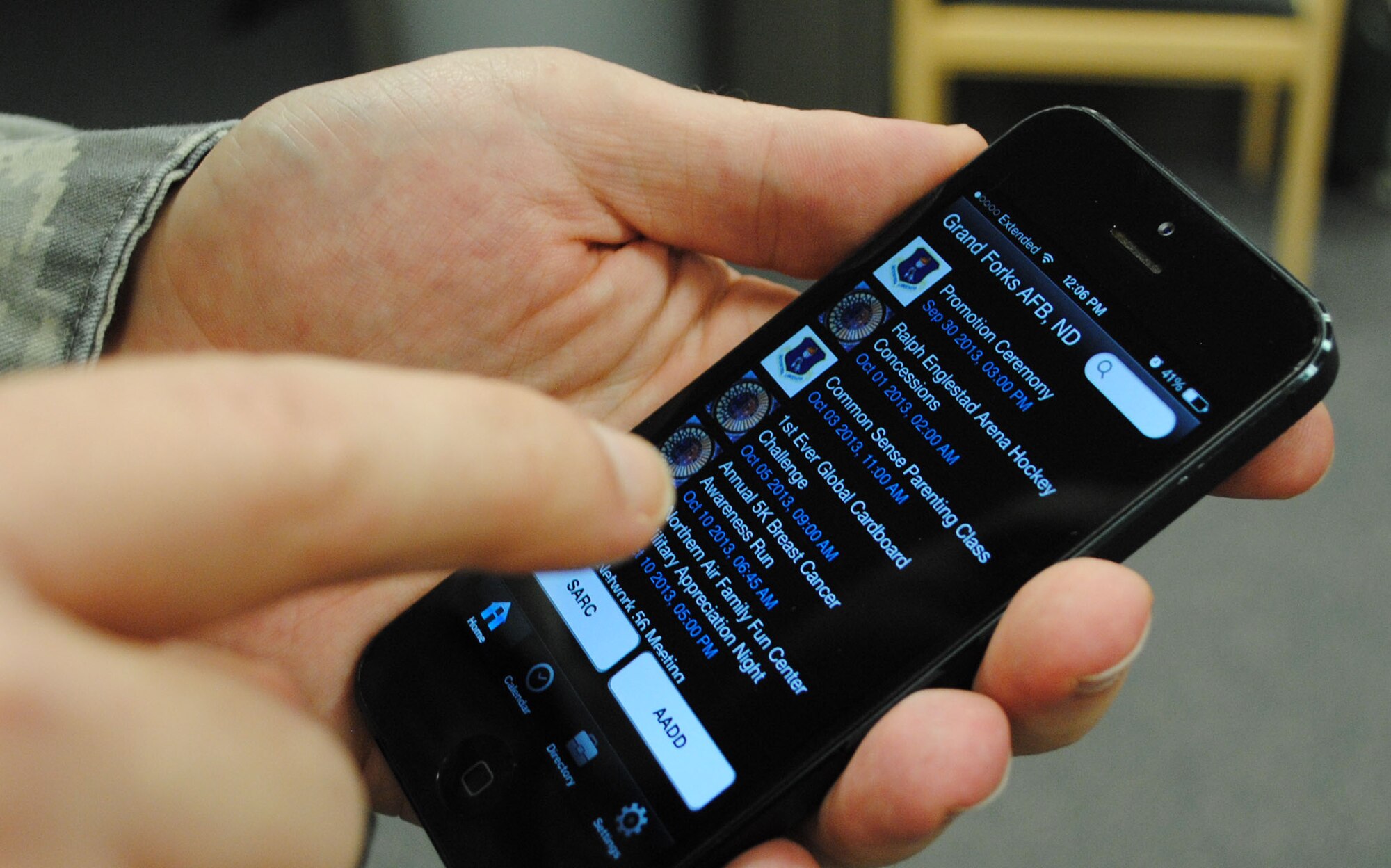 The 319th Air Base Wing has just become the latest Air Force unit to create its very own app as part of the My Military Communities project. The myMC2 app allows events posted on Facebook to be displayed on mobile devices automatically. (U.S. Air Force graphic/Staff Sgt. Luis Loza Gutierrez)(This image was cropped to place focus on the subject) 

