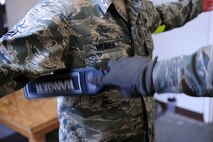 U.S. Air Force Staff Sgt. Wesley Weaver, 4th Aircraft Maintenance Squadron avionics system specialist, goes through a security check during Operational Readiness Exercise (ORE) CORONET WARRIOR 13-04 at Seymour Johnson Air Force Base, N.C., Oct. 7, 2013.  The 4th Fighter Wing uses OREs to test and prepare Airmen to transition into a war-time environment at a moment’s notice.  (U.S. Air Force photo by Airman 1st Class Brittain Crolley)