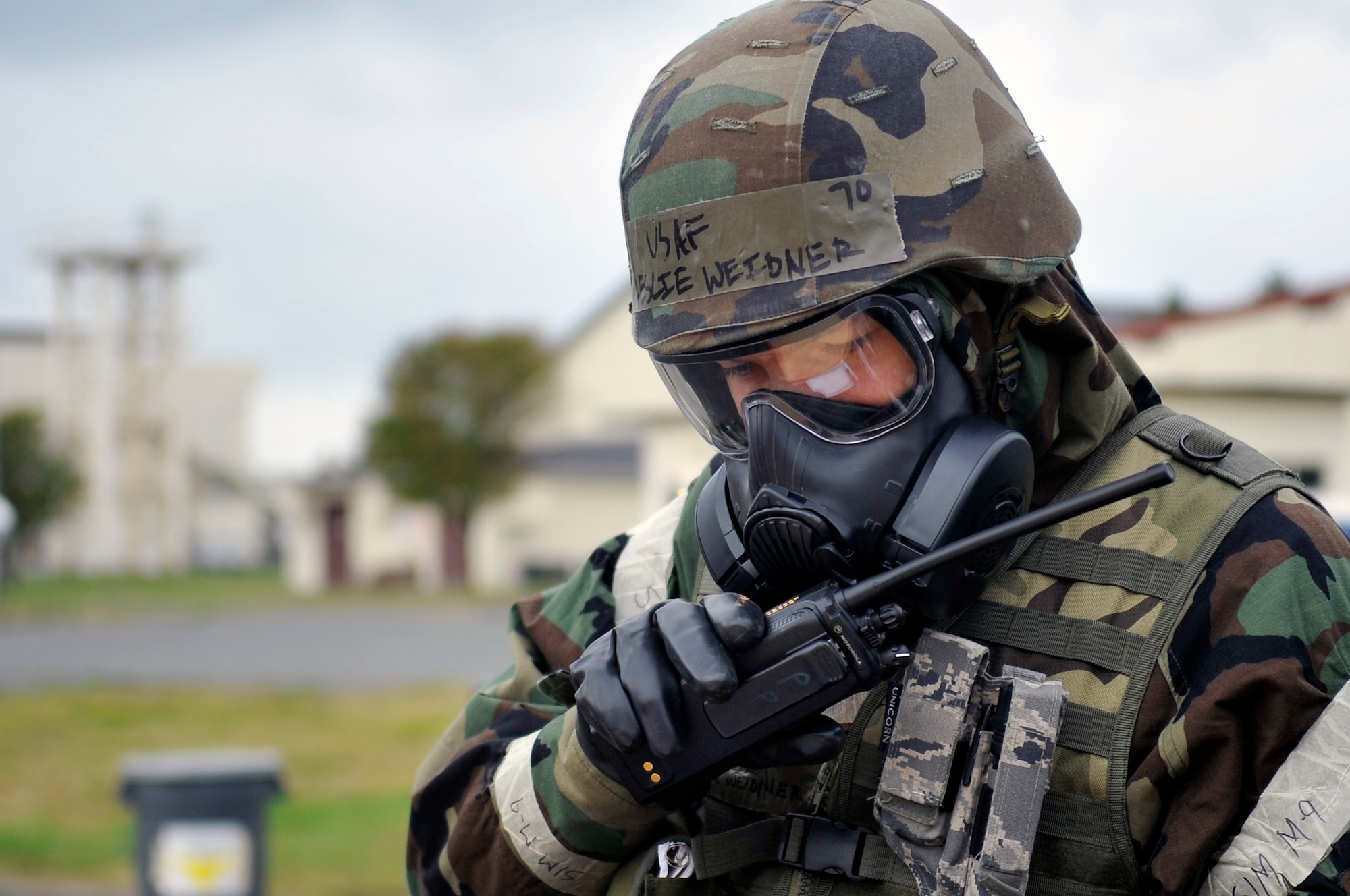 U.S. Air Force Staff Sgt. Leslie Weidner, 35th Civil Engineer Squadron Damage Assessment Response Team member, radios in an inject during an Operational Readiness Exercise at Misawa Air Base, Japan, Oct. 7, 2013. The purpose of DART is to monitor and assess damage to critical infrastructure during the exercise. (U.S. Air Force photo by Airman 1st Class Zachary Kee)