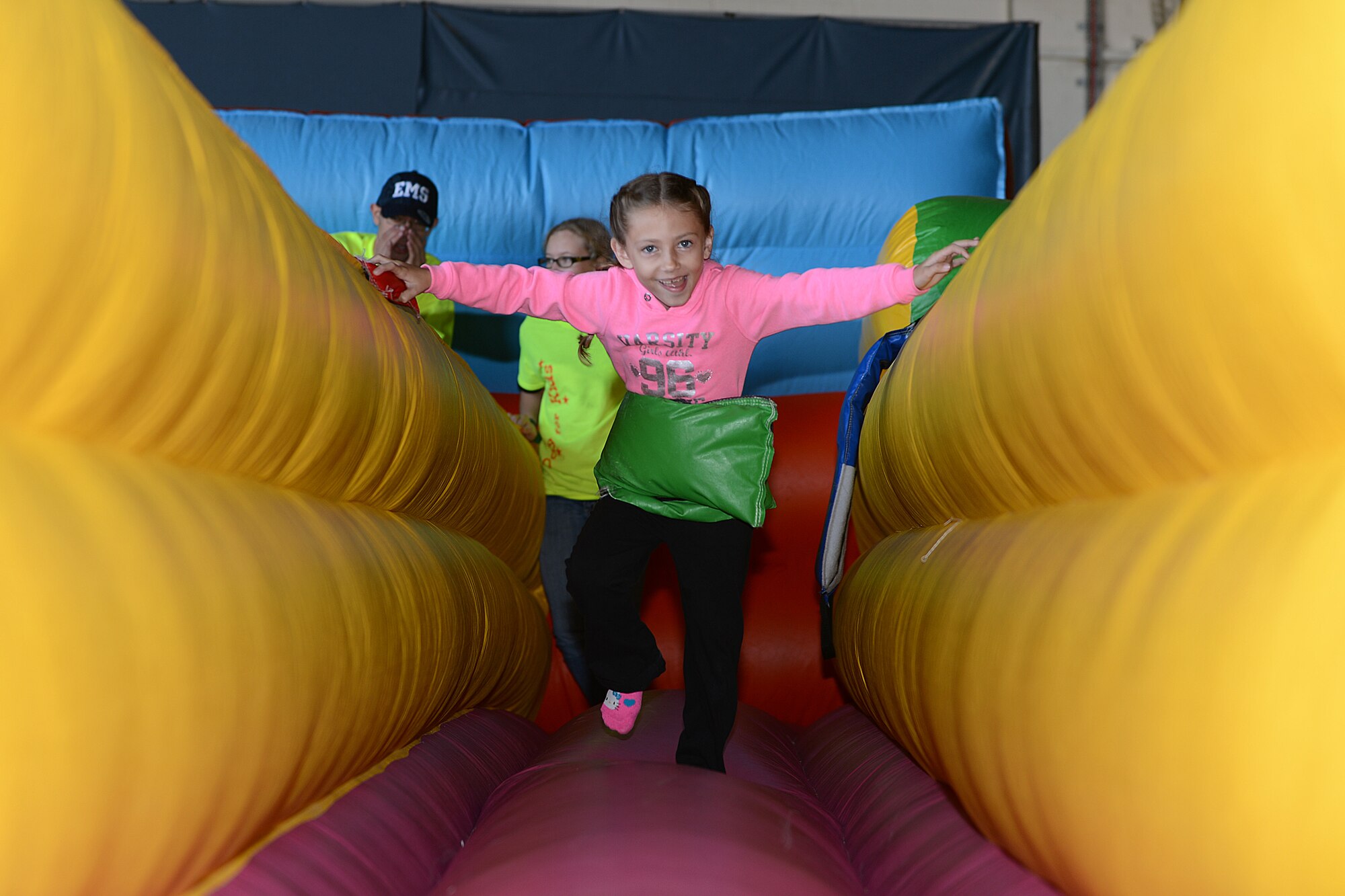 Julaina Eberhart, 6, daughter of Master Sgt. Michael Eberhart, 7th Special Operations Squadron flight engineer, plays during the Day for Kids event at Royal Air Force Lakenheath, England, Sept. 28, 2013. The Day for Kids was an opportunity for children to celebrate being a kid and provide parents with the opportunity to chat with experts regarding health or developmental concerns. (U.S. Air Force photo by Airman 1st Class Trevor T. McBride)