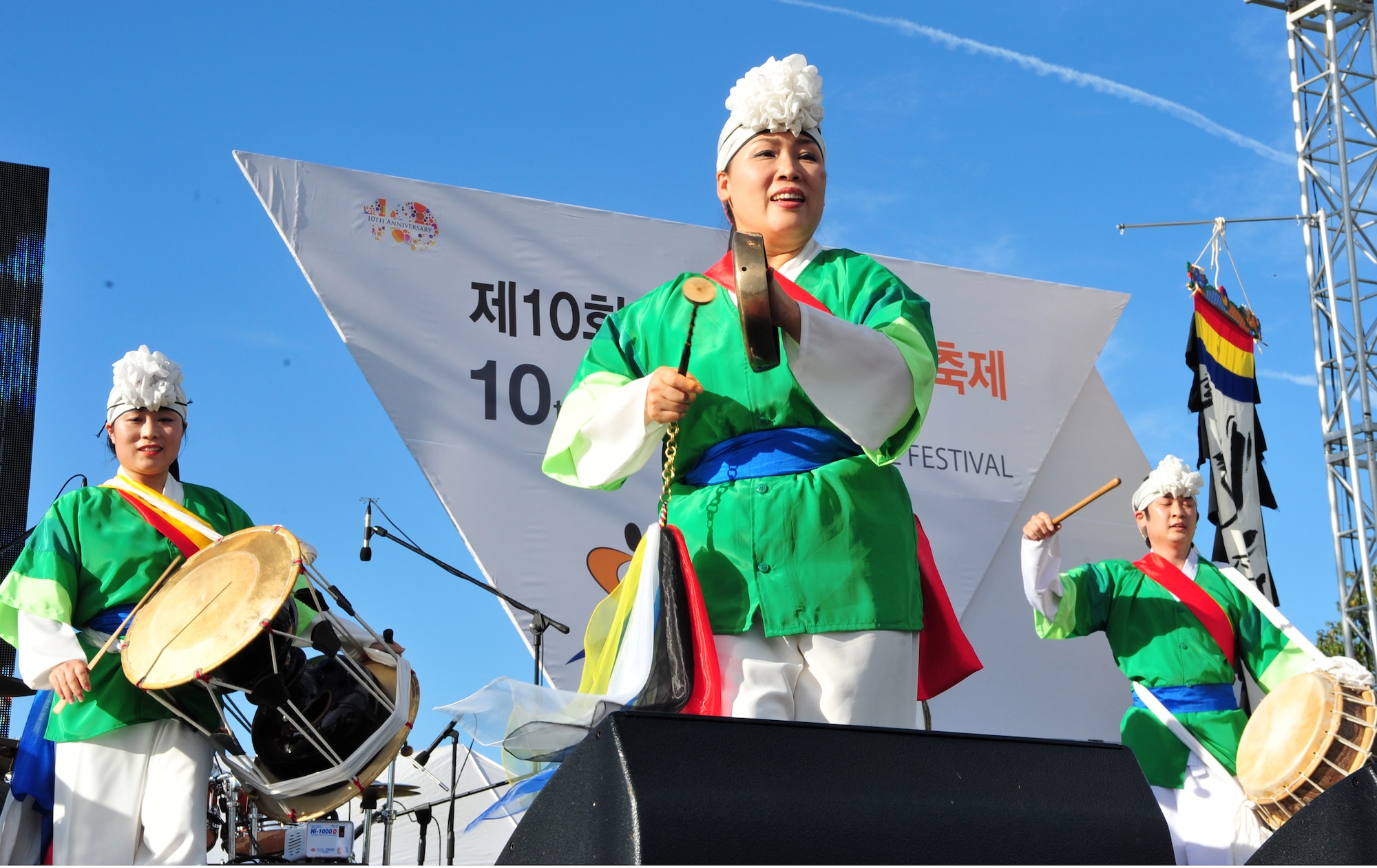 A traditional Korean farmers dance is performed during the 10th Annual Korean-American Friendship Festival in the Songtan Entertainment District, Republic of Korea, Oct. 5, 2013. The music is known as nongak, and was used to help pass the time during group labor in agricultural settings. (U.S. Air Force photo/Airman 1st Class Ashley J. Thum)