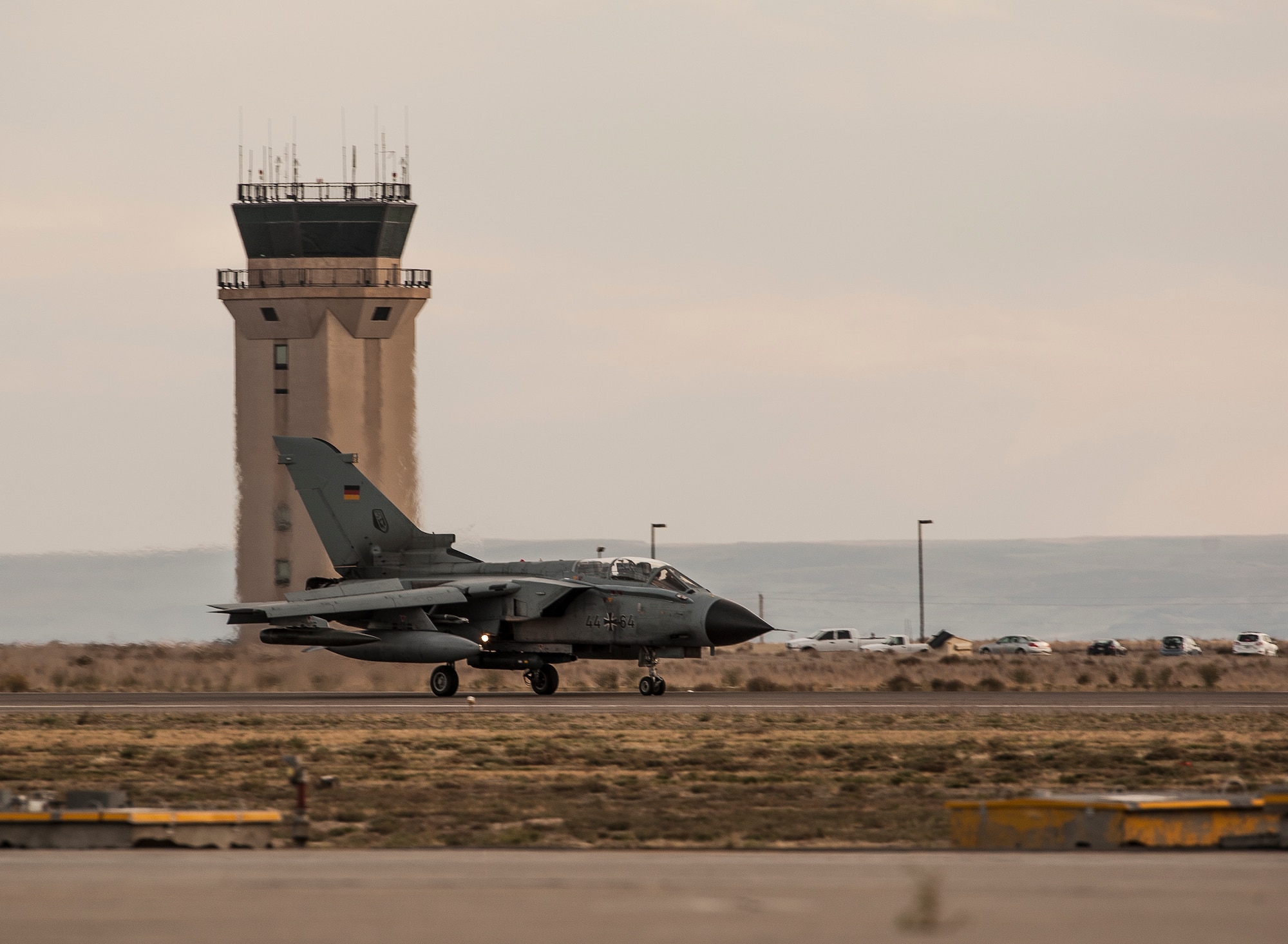 A German Air Force AG-51 Tornado lands at Mountain Home Air Force Base, Idaho, Oct. 7, 2013, during exercise Mountain Roundup 2013, a multinational combined-joint exercise which is part of the German Air Force Tornado Fighter Weapons Instructor Course Mission Employment Phase, scheduled to end here Oct. 16. The base and the 266th Range Squadron control and maintain emitter sites across almost 7,500-square miles of operational range space, and it's that access to airspace and ranges that allows for realistic, safe training and testing while providing the flexibility to accommodate the complexity of this multinational, multiservice exercise. (U.S. Air Force photo by Master Sgt. Kevin Wallace/RELEASED)
