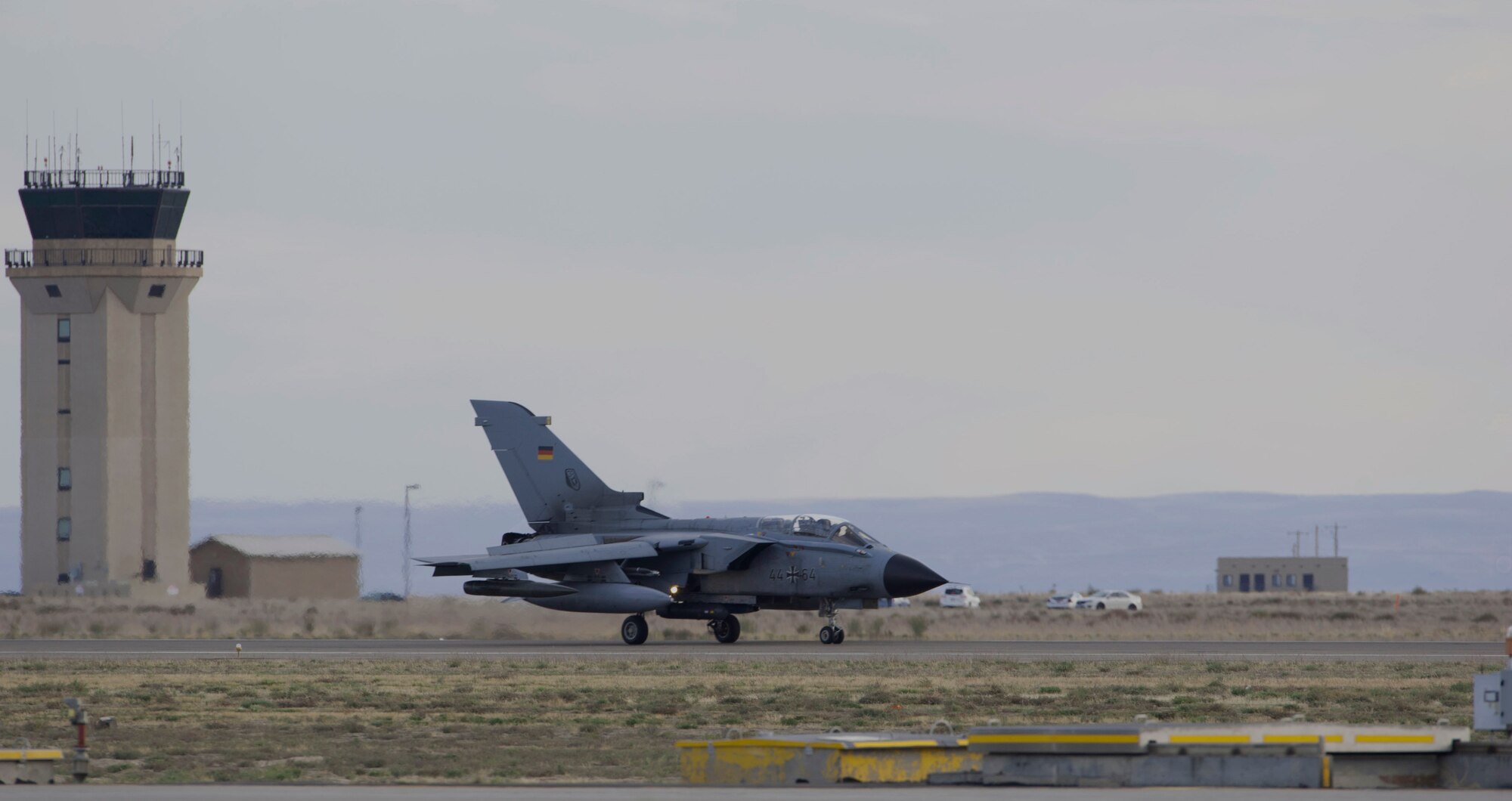 A German Air Force AG-51 Tornado lands Oct.7, 2013, at Mounain Home Air Force Base, Idaho. The GAF Tornados are currently training with U.S. Air Force, Navy and Marines during Mountain Roundup, a multi-national combat exercise. (U.S. Air Force photo by Master Sgt. Kevin Wallace/RELEASED)