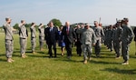Polish President Bronislaw Komorowski visited Illinois Army National Guard Soldiers and five Polish officers who were conducting training May 20, 2012 at the Marseilles Training Center in Marseilles, Ill. Komorowski was accompanied by Illinois Gov. Pat Quinn and senior leaders of the Illinois National Guard, to include Army Maj. Gen. William L. Enyart, the adjutant general of the Illinois National Guard. Komorowski presented Quinn, Enyart, and 13 other Illinois Guard members with the Commander's Cross of the Order of Merit of the Republic of Poland, an honor that is bestowed upon foreigners for distinguished contributions to international cooperation with the nation of Poland.