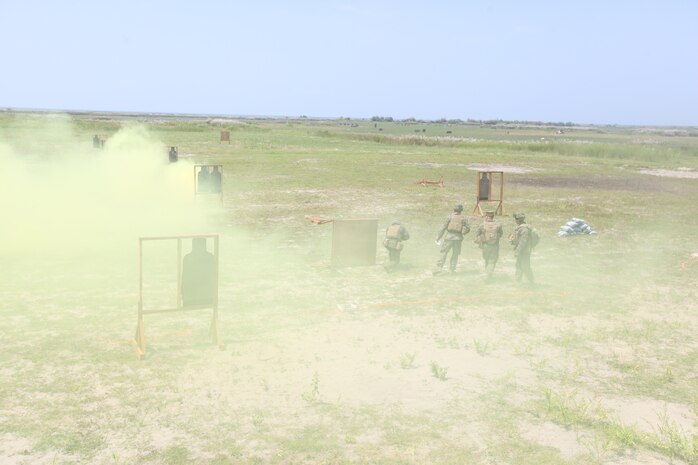 U.S. Marines with Combined Anti-Armor Team 1, Weapons Company, 3rd Battalion, 3rd Marine Regiment, assigned to the 3rd Marine Expeditionary Brigade, III Marine Expeditionary Force, engage targets using M16A4 rifles while conducting a stress shoot during Amphibious Landing Exercise (PHIBLEX) 14 at Naval Station Leovigildo Gantioqui in San Antonio, Zambales province, Philippines, Oct. 6, 2013. A stress shoot incorporated physical exercises before shooting to increase the service members' fatigue in order to simulate combat conditions. PHIBLEX is a bilateral training exercise designed to improve the interoperability, readiness and professional relationships between the U.S. Marine Corps and partner nations.