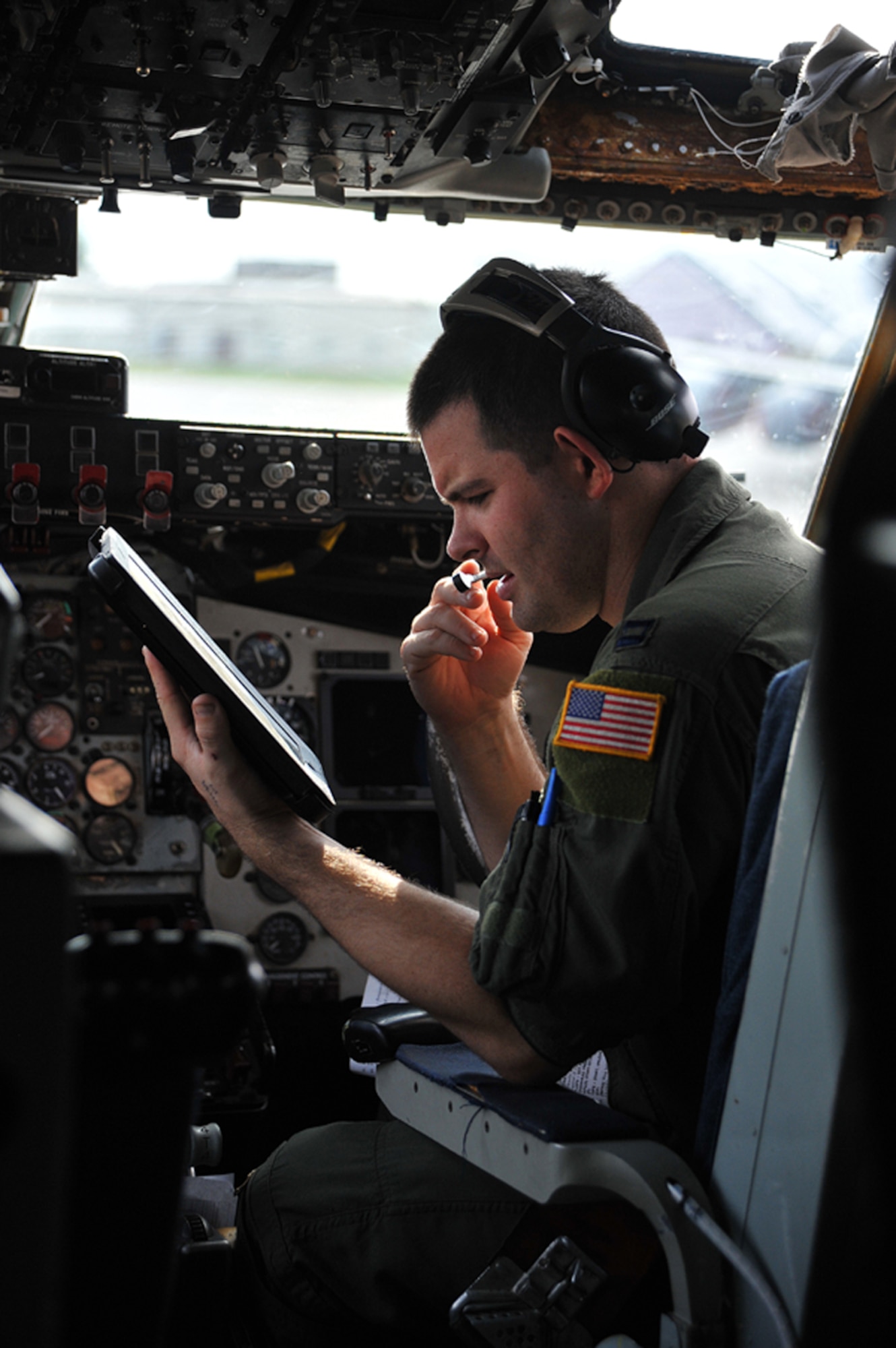 Captain Scott Huntley, 350th Air Refueling Squadron pilot and aircraft commander, reviews a checklist, Oct. 4, 2013, prior to pre-flight inspections at McConnell Air Force Base, Kan. Huntley is a Fort Lauderdale, Fla., native and one of more than 200 pilots assigned to the largest air refueling wing in the world.  (U.S. Air Force photo/Staff Sgt. Jess Lockoski)