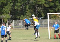 Students from Air War College and Air Command Staff College compete in a soccer match on Maxwell Air Force Base, Oct. 8. The game was part of a 2-day competition between the academic powerhouses compiling of approximately 20 events, both scholastic and athletic. (U.S. Air Force photo by Airman 1st Class William Blankenship)