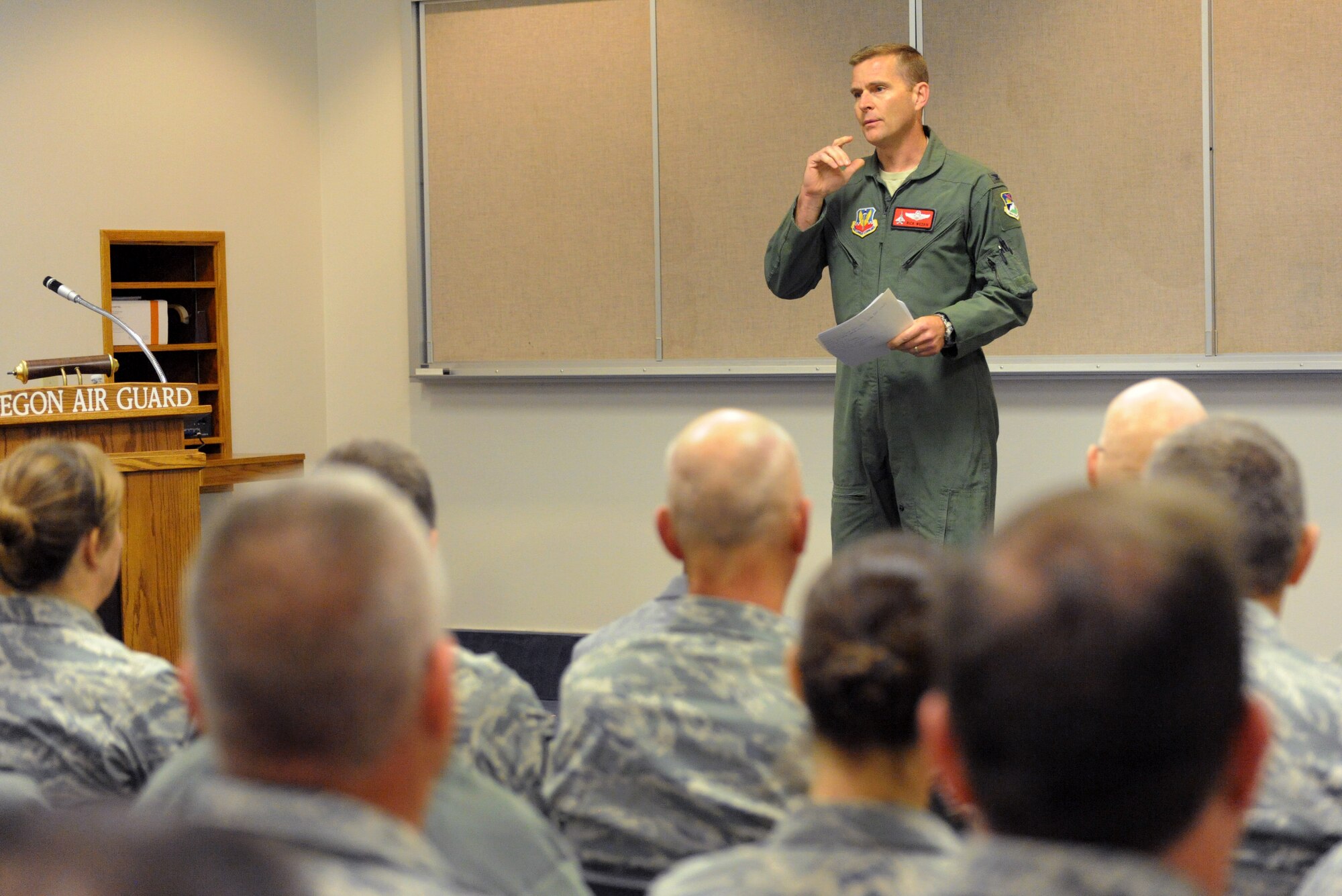 Oregon Air National Guard Col. Richard Wedan, 142nd Fighter Wing Commander, address Airmen of the 142nd Fighter Wing at the Portland Air National Guard Base, Ore., Oct. 8, 2013, during a Town Hall meeting to discuss the current conditions of the unit and members as a result of the U.S. Government shutdown.  (Air National Guard photo by Tech. Sgt. John Hughel, 142nd Fighter Wing Public Affairs/Released)