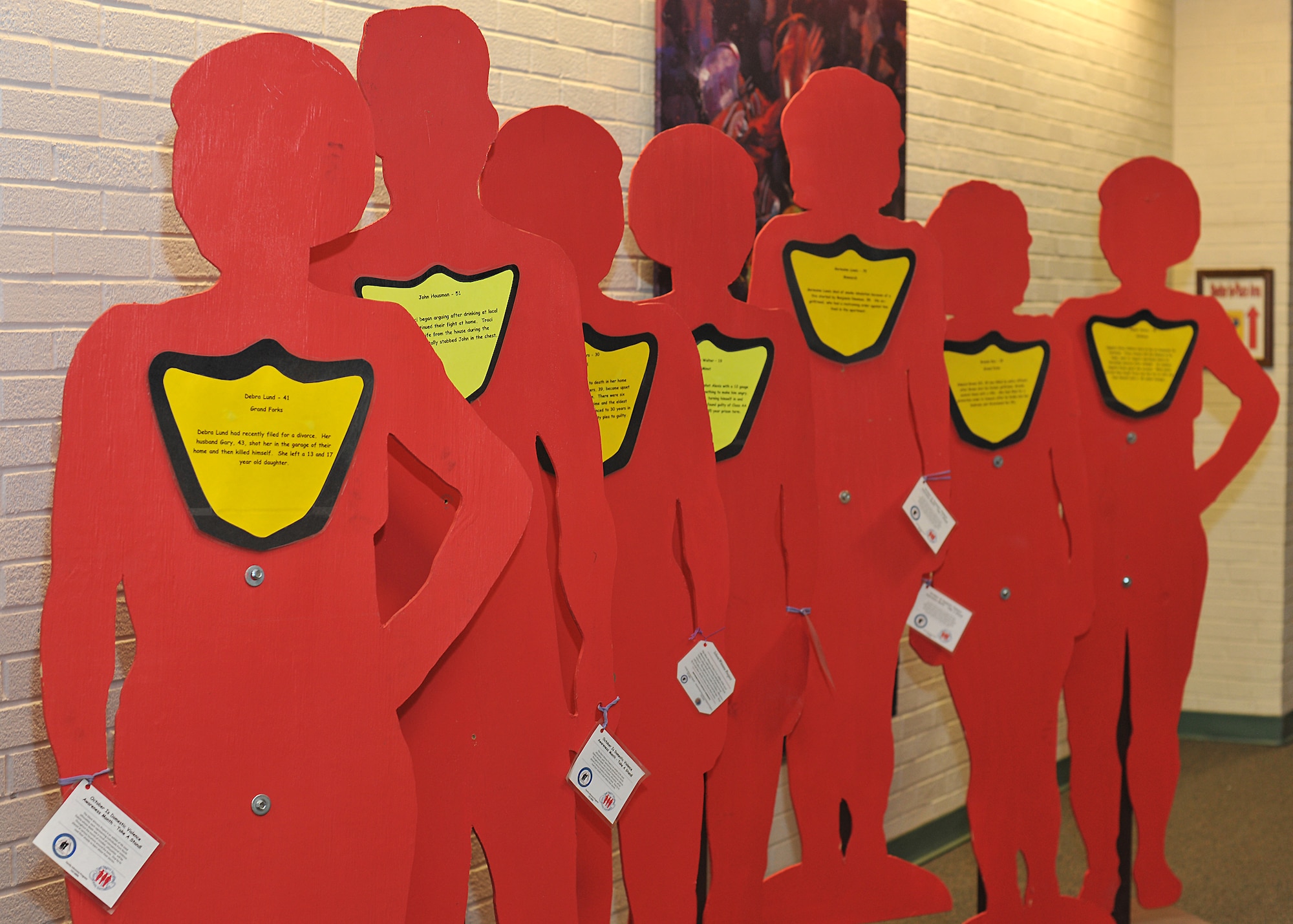 October is Domestic Violence Awareness Month and in an effort to increase awareness, the base fitness center displays silhouettes that represent victims of domestic violence and stresses the importance of prevention throughout the month of October on Grand Forks Air Force Base, N.D. If you or someone you know is a victim of domestic violence, call 911 or the National Domestic Violence Hotline at 1-800-799-7233. (U.S. Air Force photo/ Senior Airmen Xavier Navarro)