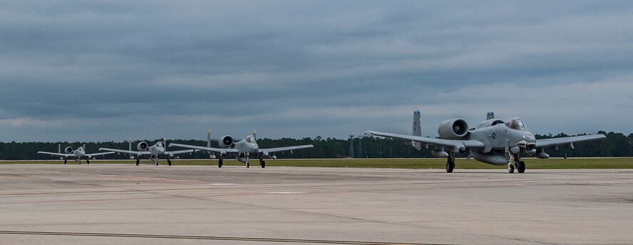 A total of 11 A-10C Thunderbird IIs from the 74th Fighter Squadron return to Moody Air Force Base, Ga., Oct. 8, 2013. Four more A-10s are scheduled to arrive later this month after deployment to Bagram Airfield, Afghanistan. (U.S. Air Force photo by Airman 1st Class Alexis Grotz/Released)