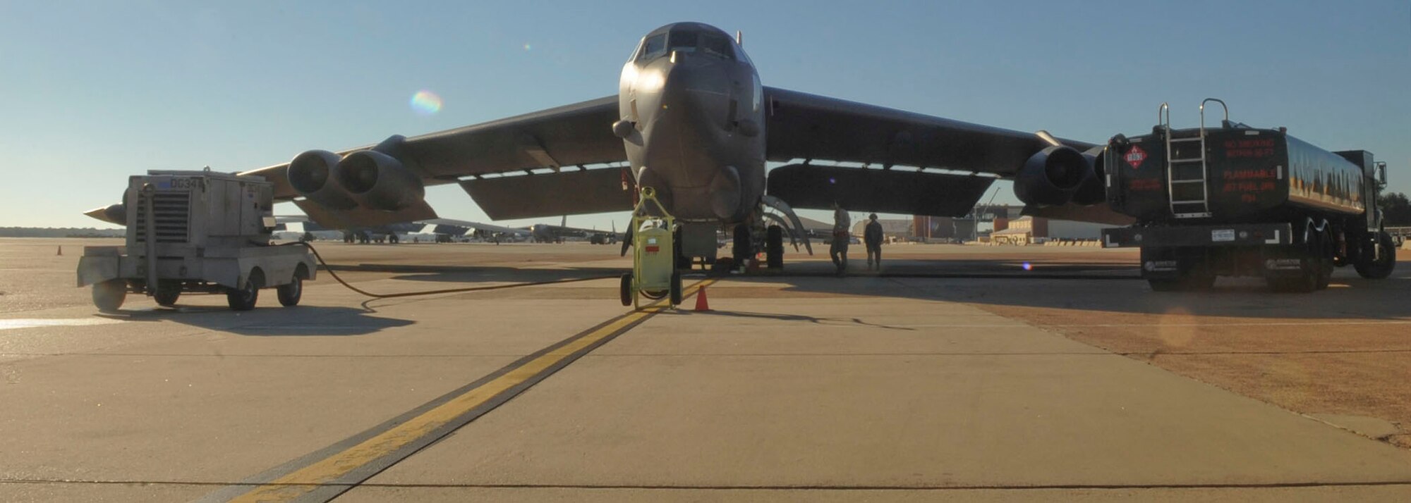 Airmen from 2nd Logistics Readiness Squadron assist 2nd Aircraft Maintenance Squadron Airmen with refueling a B-52H Stratofortress on Barksdale Air Force Base, La., Oct. 8, 2013. The B-52 is capable of flying at high subsonic speeds at altitudes up to 50,000 feet. (U.S. Air Force photo/Senior Airman Kristin High)