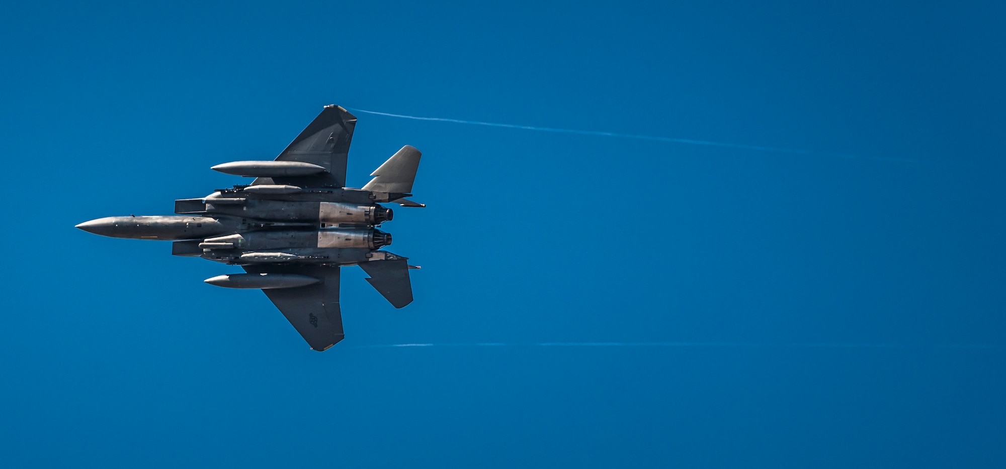 A U.S. Air Force F-15E Strike Eagle from the 389th Fighter Squadron flies over Mountain Home Air Force Base, Idaho, Oct. 5, 2013. The aircraft and its crew were deployed to Southwest Asia and returned that day amidst cheers from welcoming family and friends. (U.S. Air Force photo by Tech. Sgt. Samuel Morse/RELEASED)