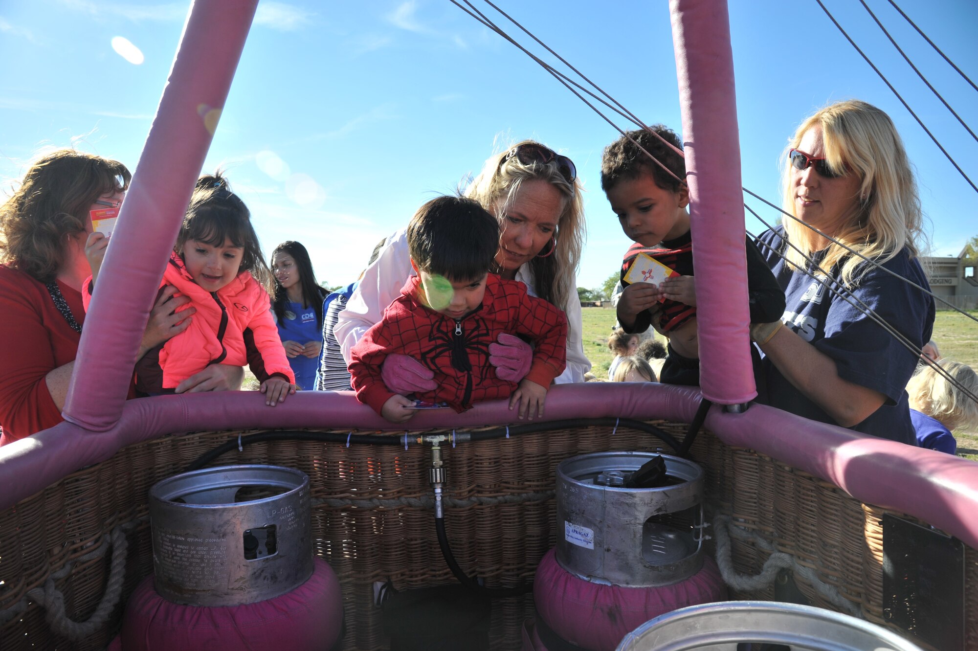 Nelly-B, a balloon piloted by a crew from Belgium, makes a stop at Kirtland's Child Development Center Oct. 7 to allow the children an up-close view. Nelly-B and its team is here for the Albuquerque International Balloon Fiesta.  (Photo by Ken Moore)