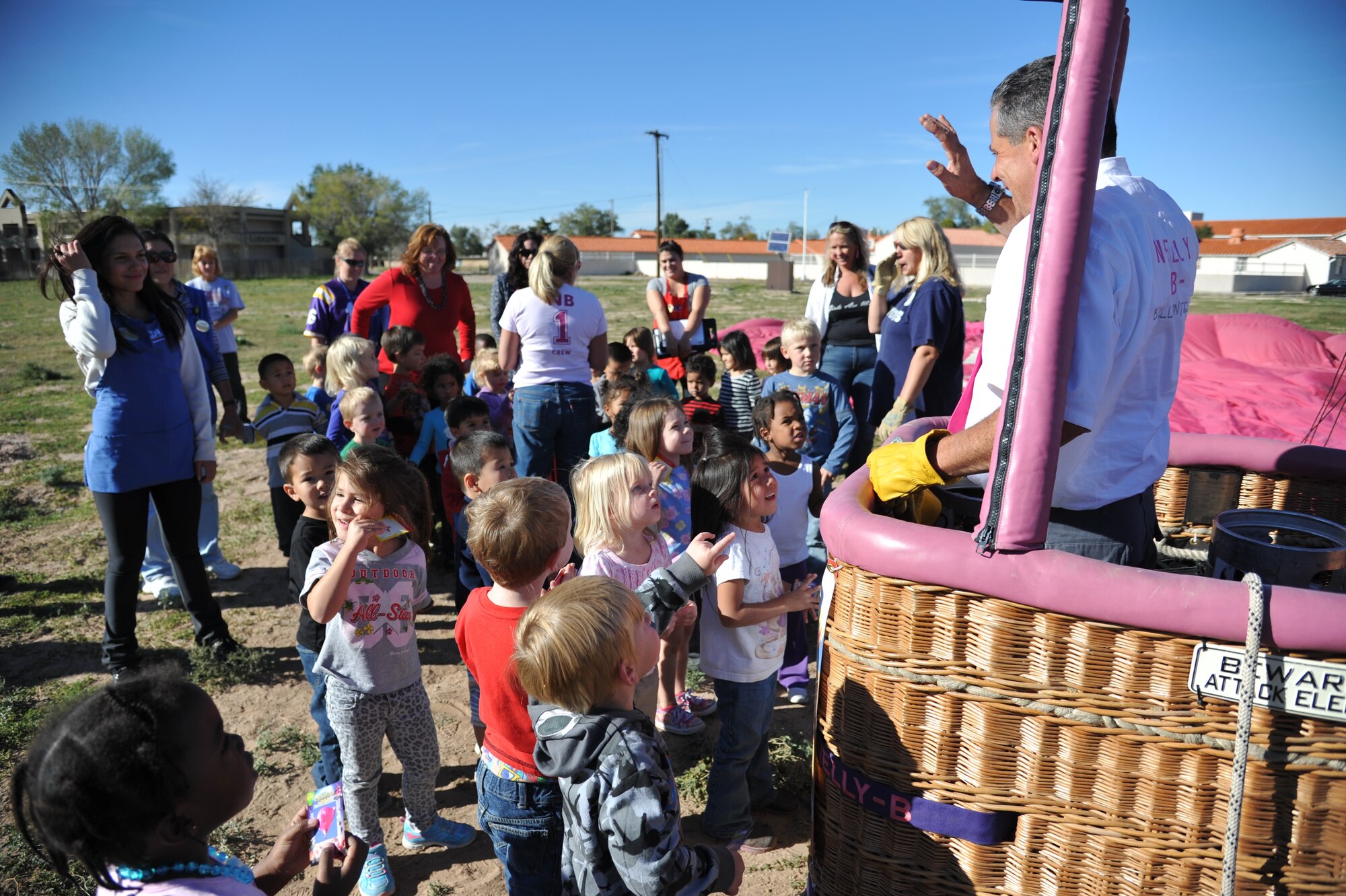 Nelly-B, a balloon piloted by a crew from Belgium, makes a stop at Kirtland's Child Development Center Oct. 7 to allow the children an up-close view. Nelly-B and its team is here for the Albuquerque International Balloon Fiesta.  (Photo by Ken Moore)